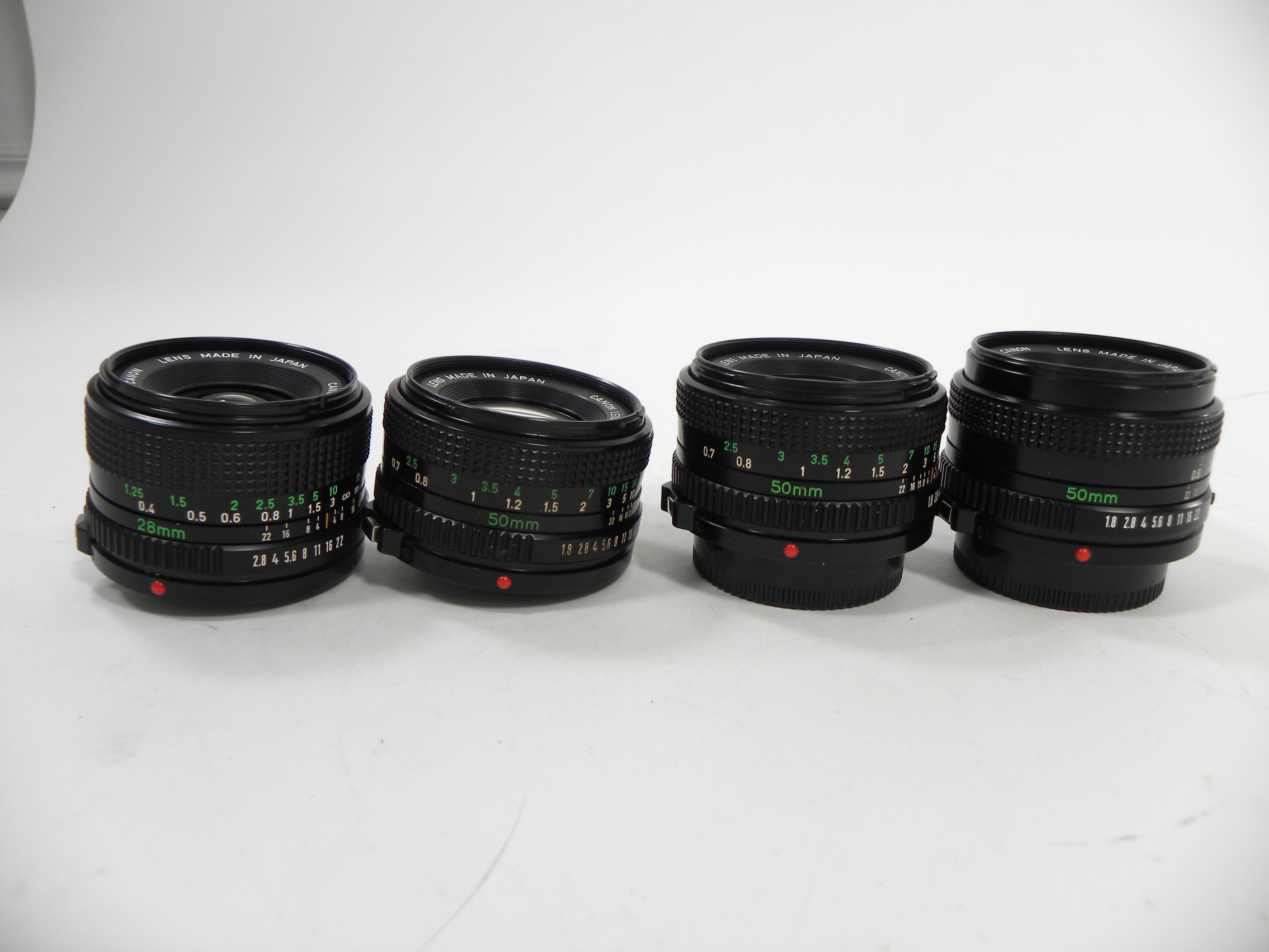 Canon FD 50mm f1.8 & 28mm f2.8 lot of 4 AS IS NO RETURNS!! (parts or repair)
