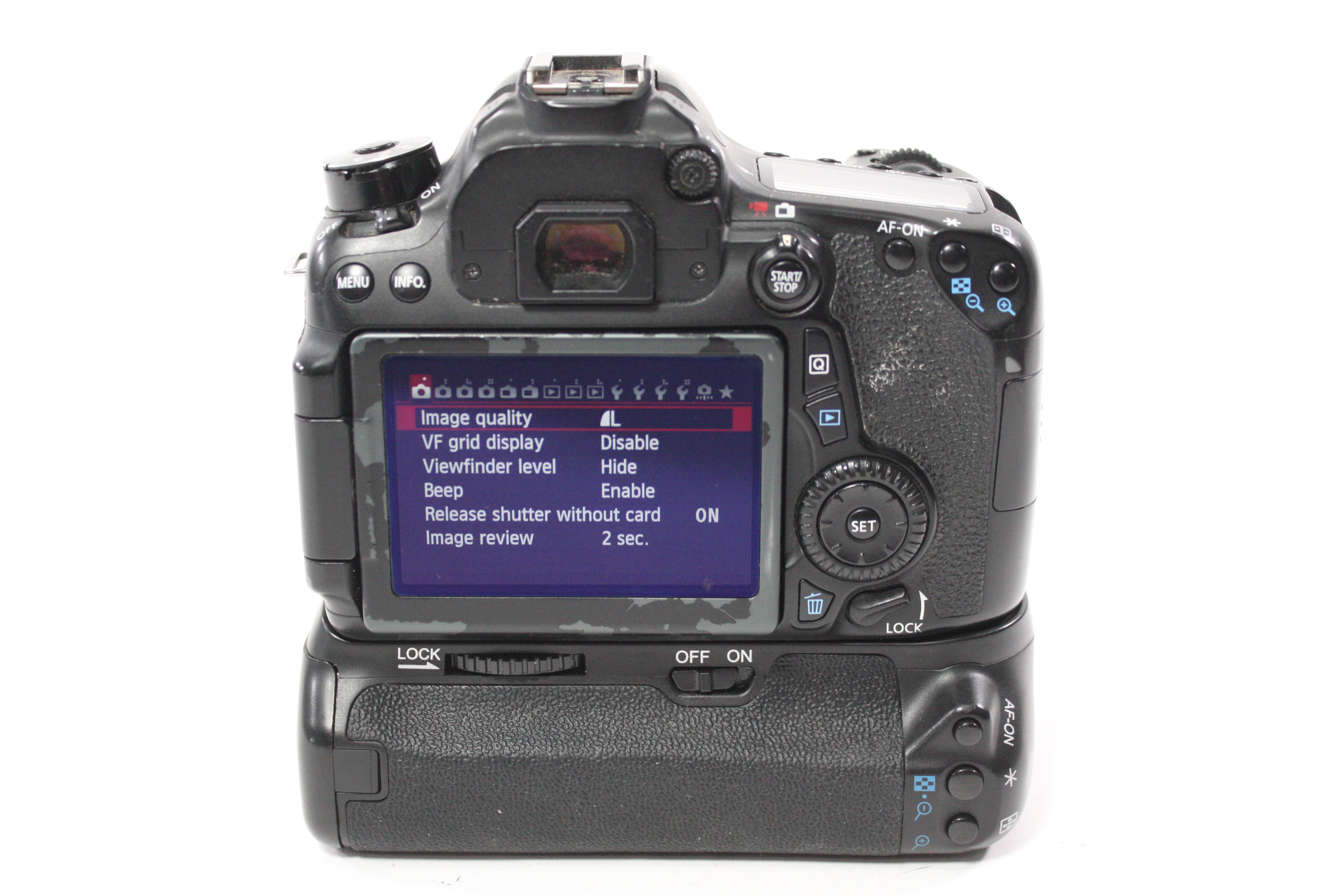 Canon 70D DSLR Camera Body with Shutter Count 31,469 With Meike MK-70D Grip (Please Read)