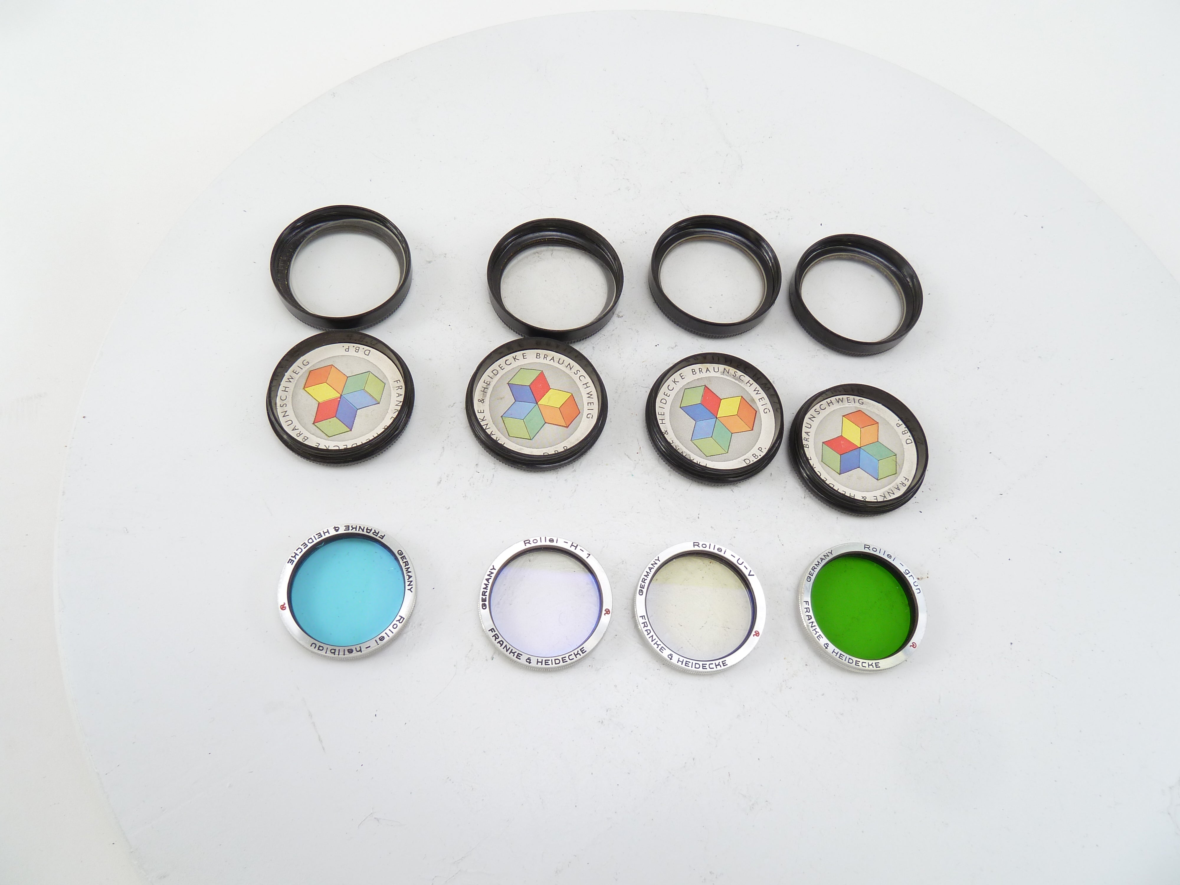 Rollei Rolleiflex 4 assorted Bayonet Filters, UV, H-1, Light Blue, and Green in cases