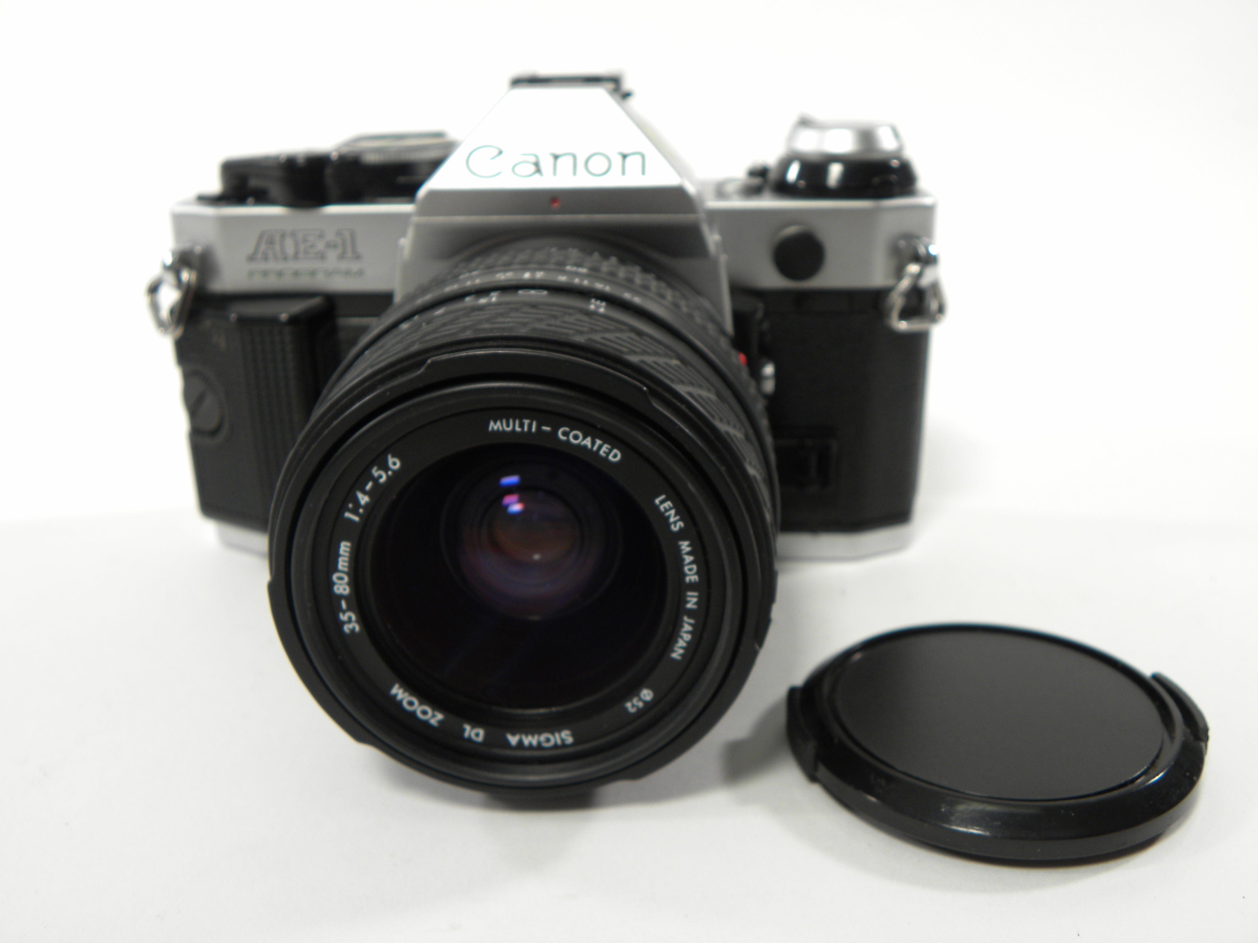 Canon AE-1 35mm Program SLR w/Sigma DL Zoom MC 35-80mm f4-5.6