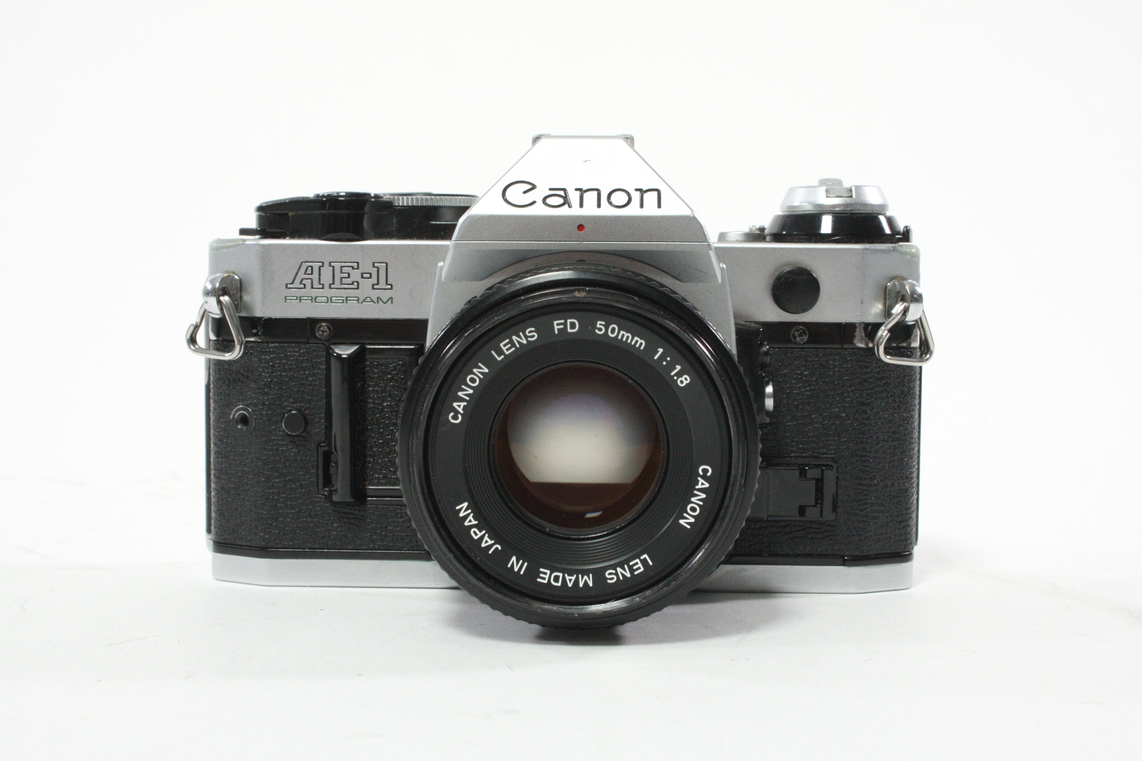Canon AE-1 Program 35mm SLR Camera with 50mm f/1.8 FD Lens