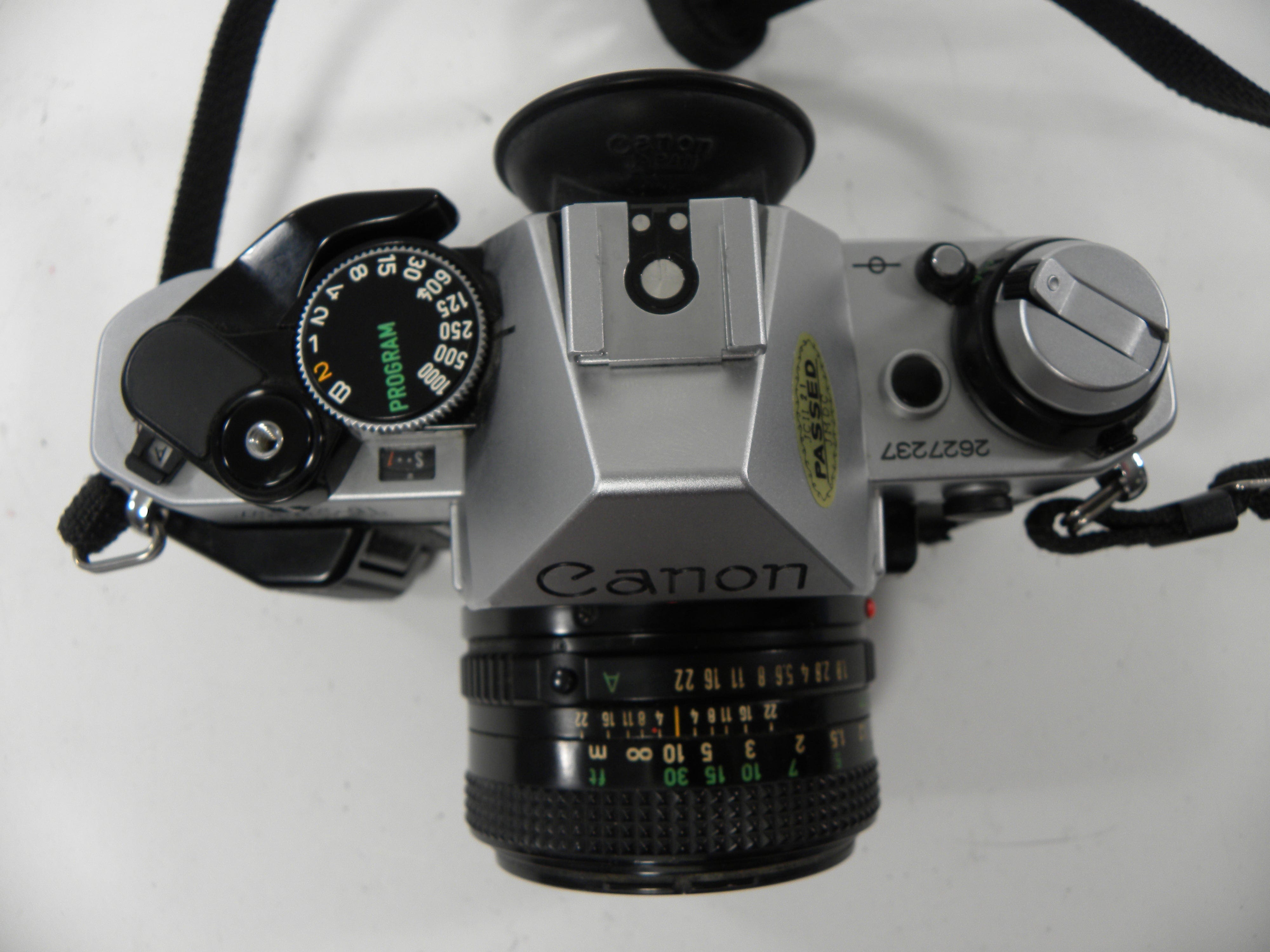 Canon AE-1 Program 35mm SLR Camera with 50mm f/1.8 FD Lens
