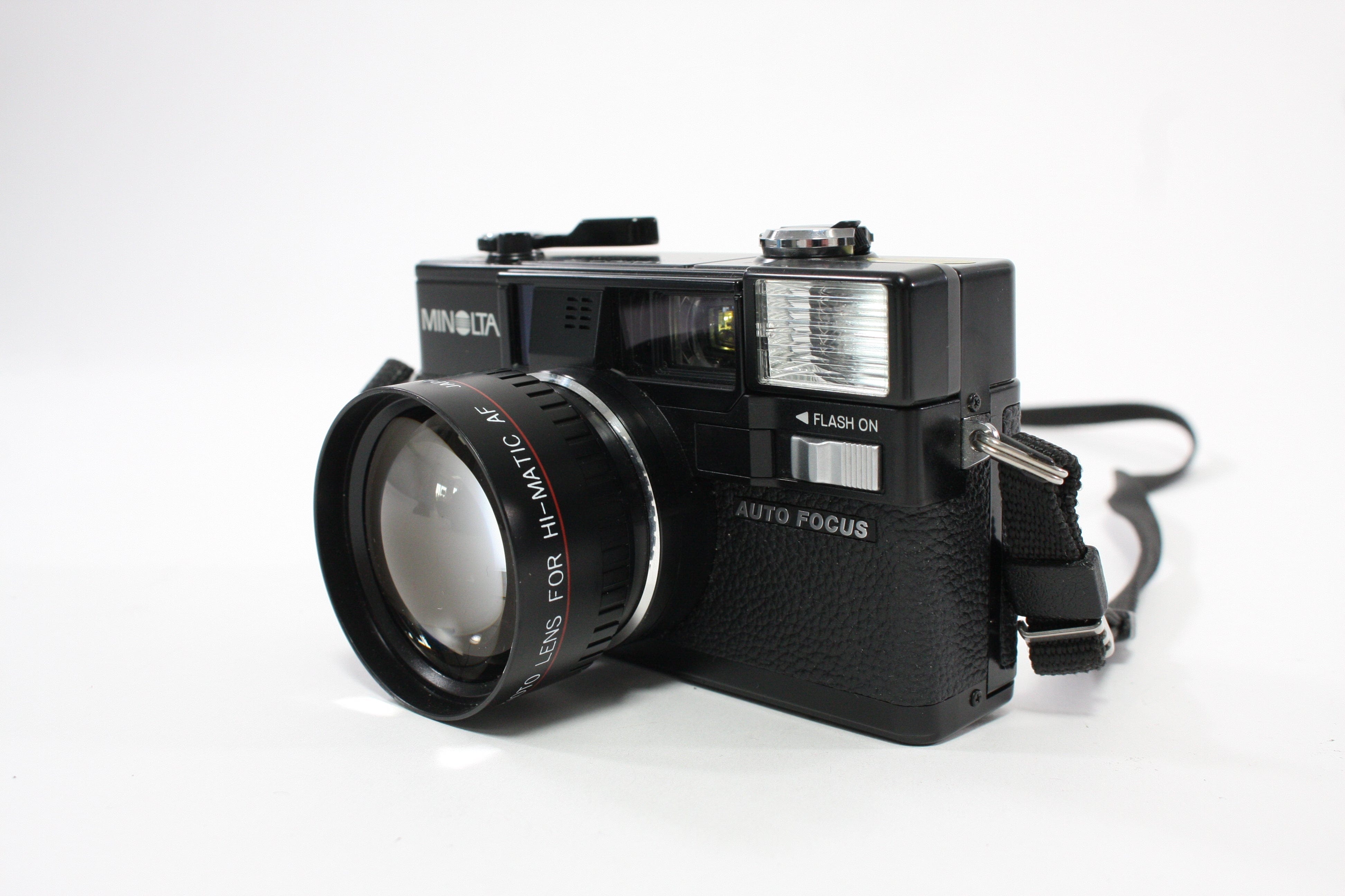 Minolta Hi-Matic AF2 with Case and Auxillary Lens