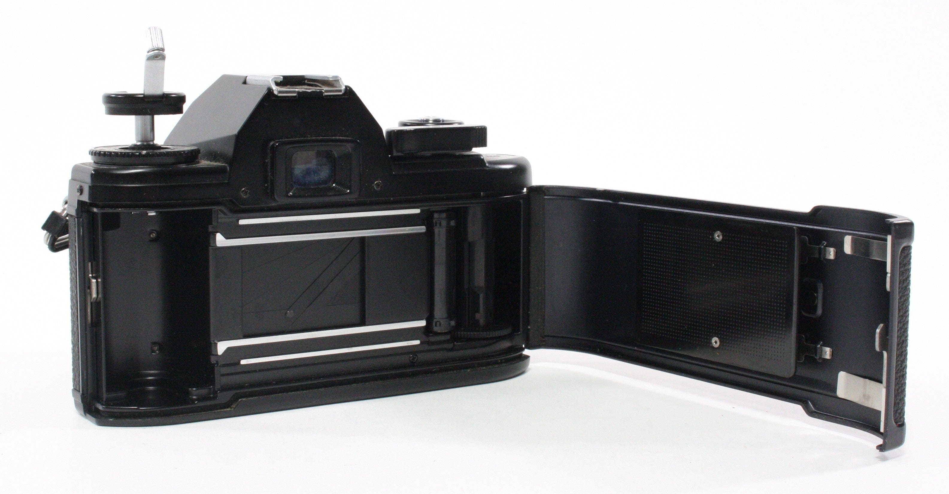 Nikon EM 35mm Camera with 50mm f/1.8 E Series Lens