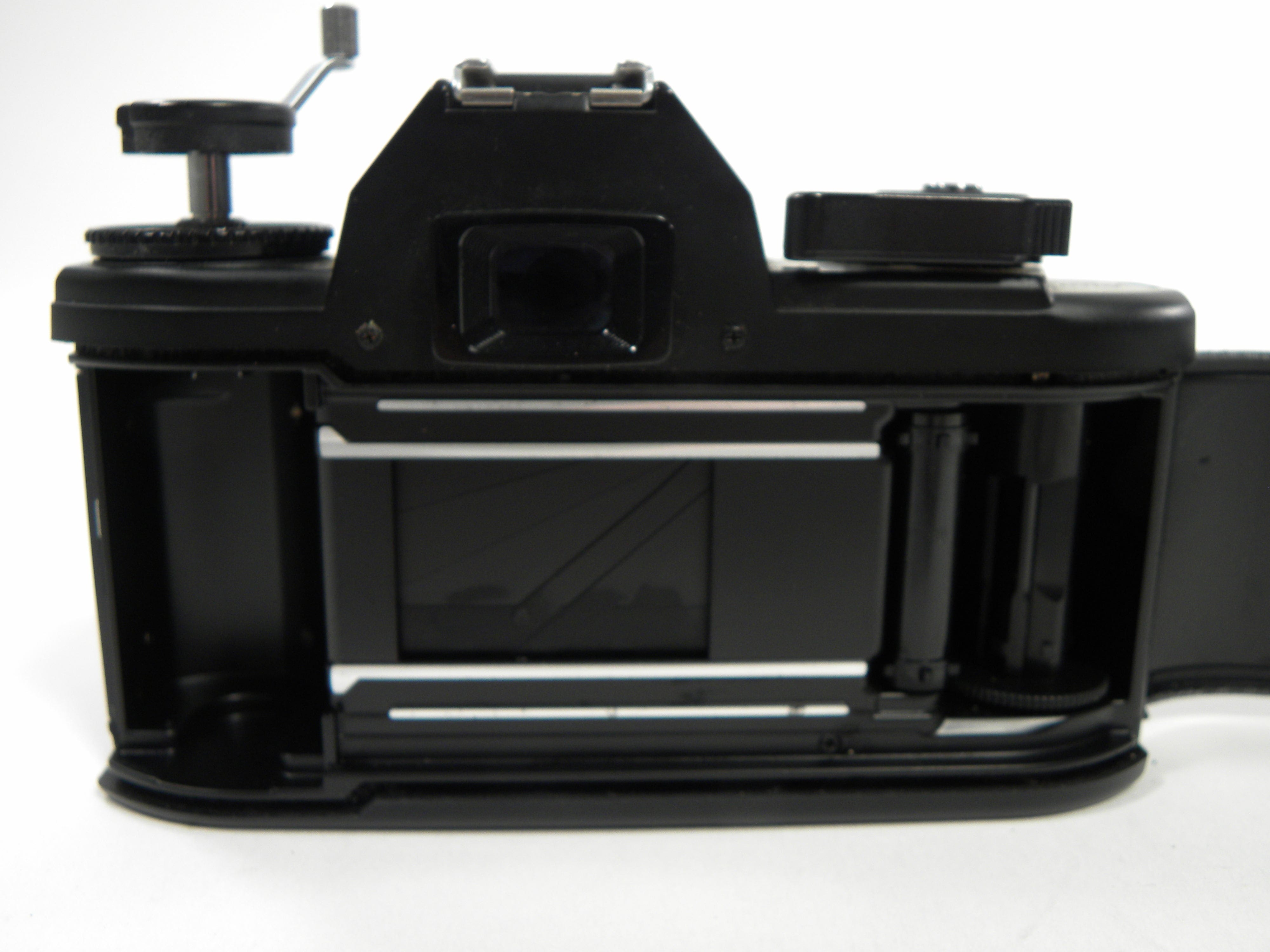 Nikon EM 35mm SLR w/50mm f1.8 AS IS! READ