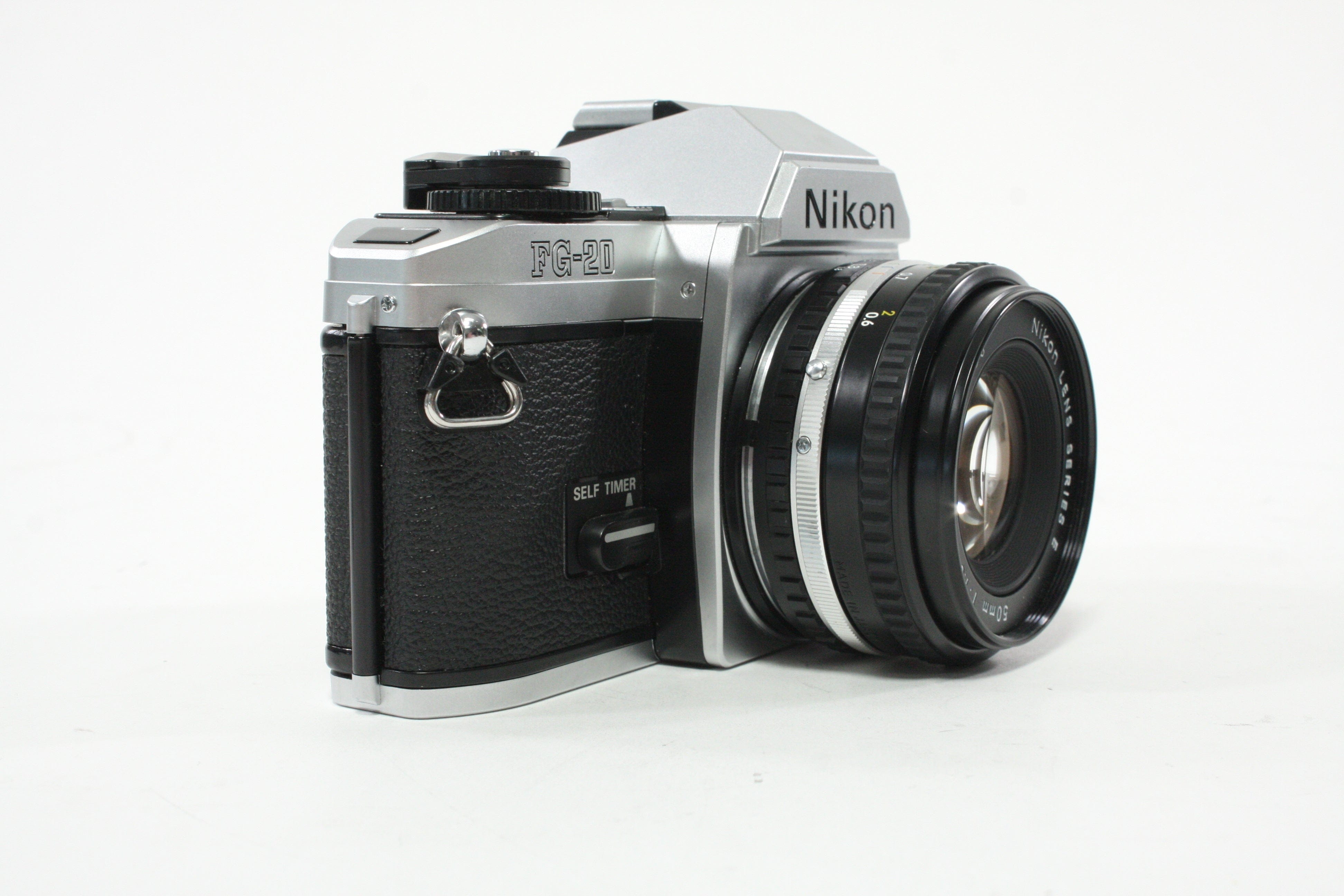Nikon FG-20 35mm SLR Camera with 50mm f/1.8 E Series F-Mount Lens