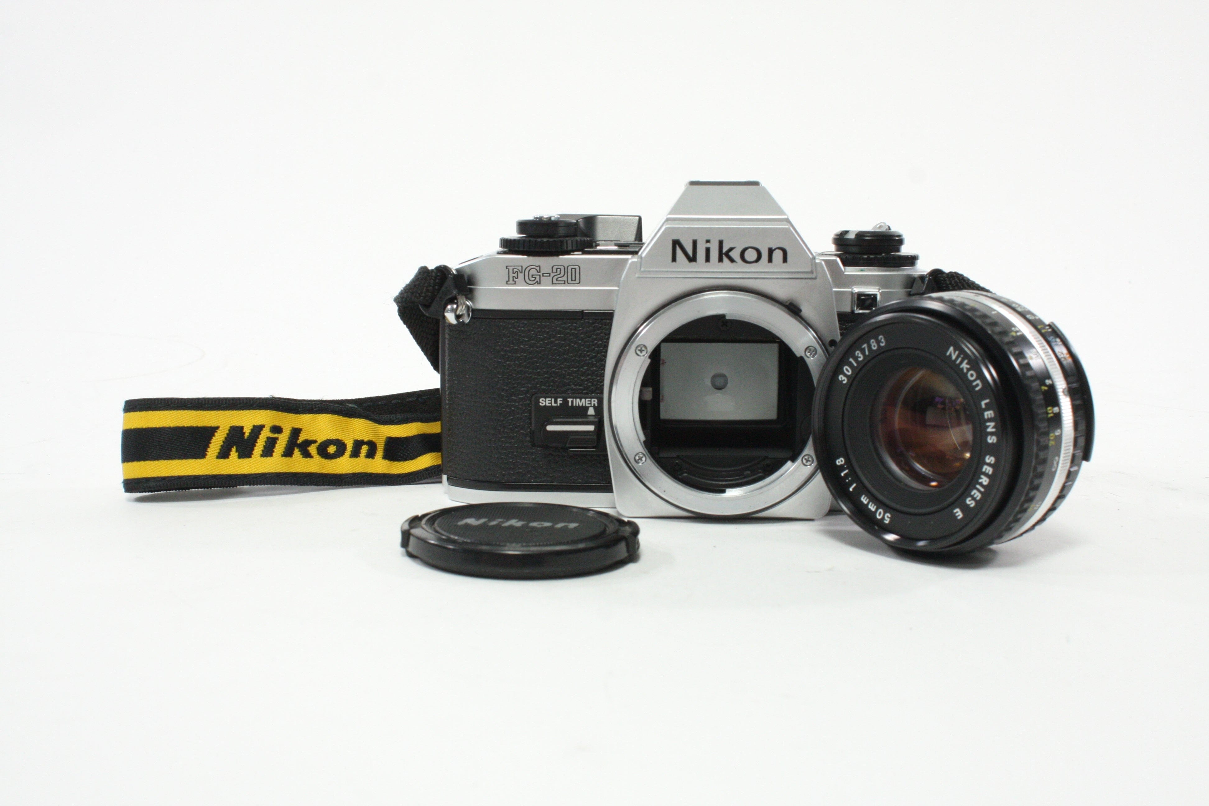 Nikon FG-20 35mm SLR Camera with 50mm f/1.8 E Series F-Mount Lens