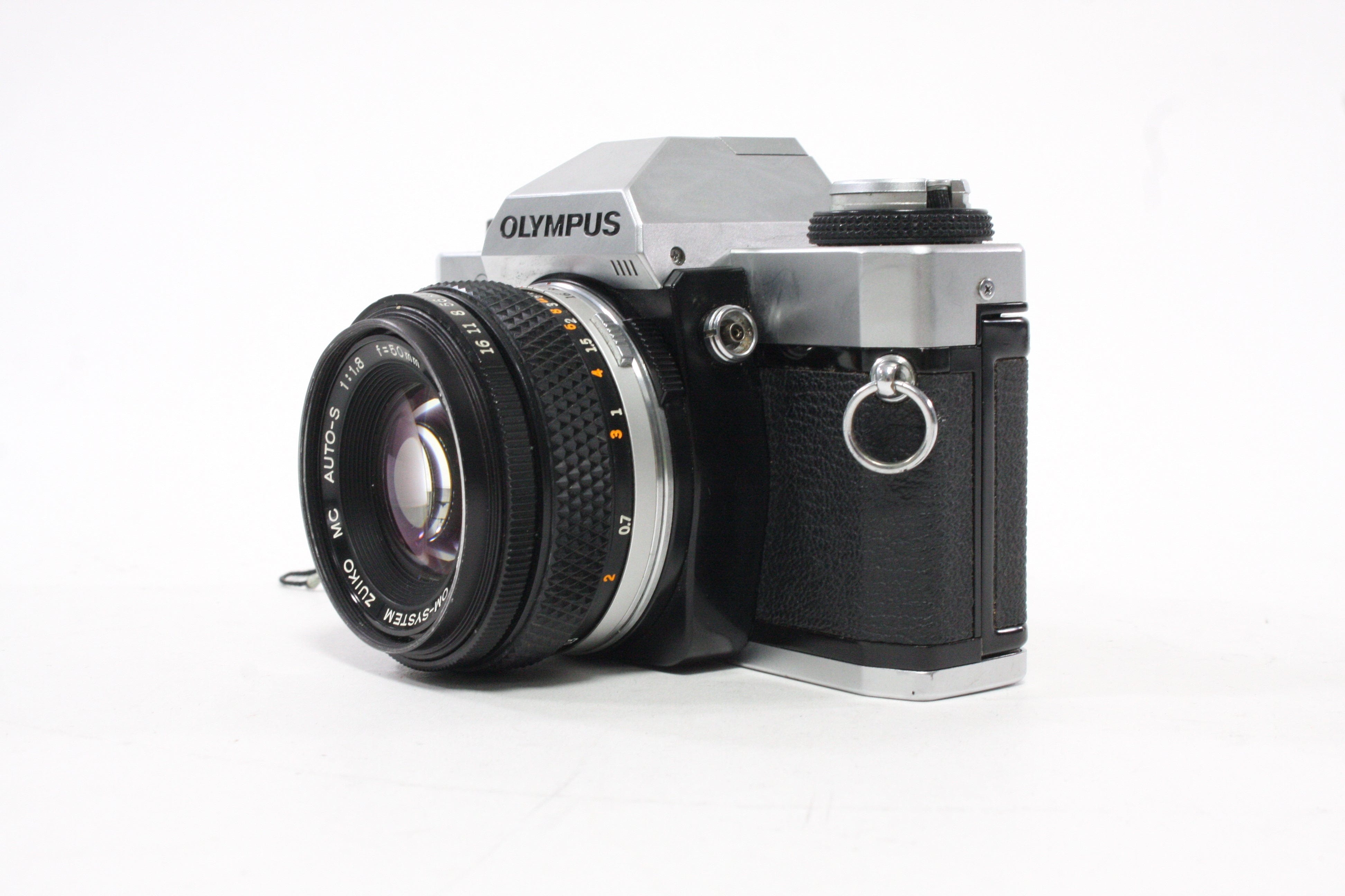 Olympus OMG 35mm SLR Camera with 50mm f/1.8 Lens