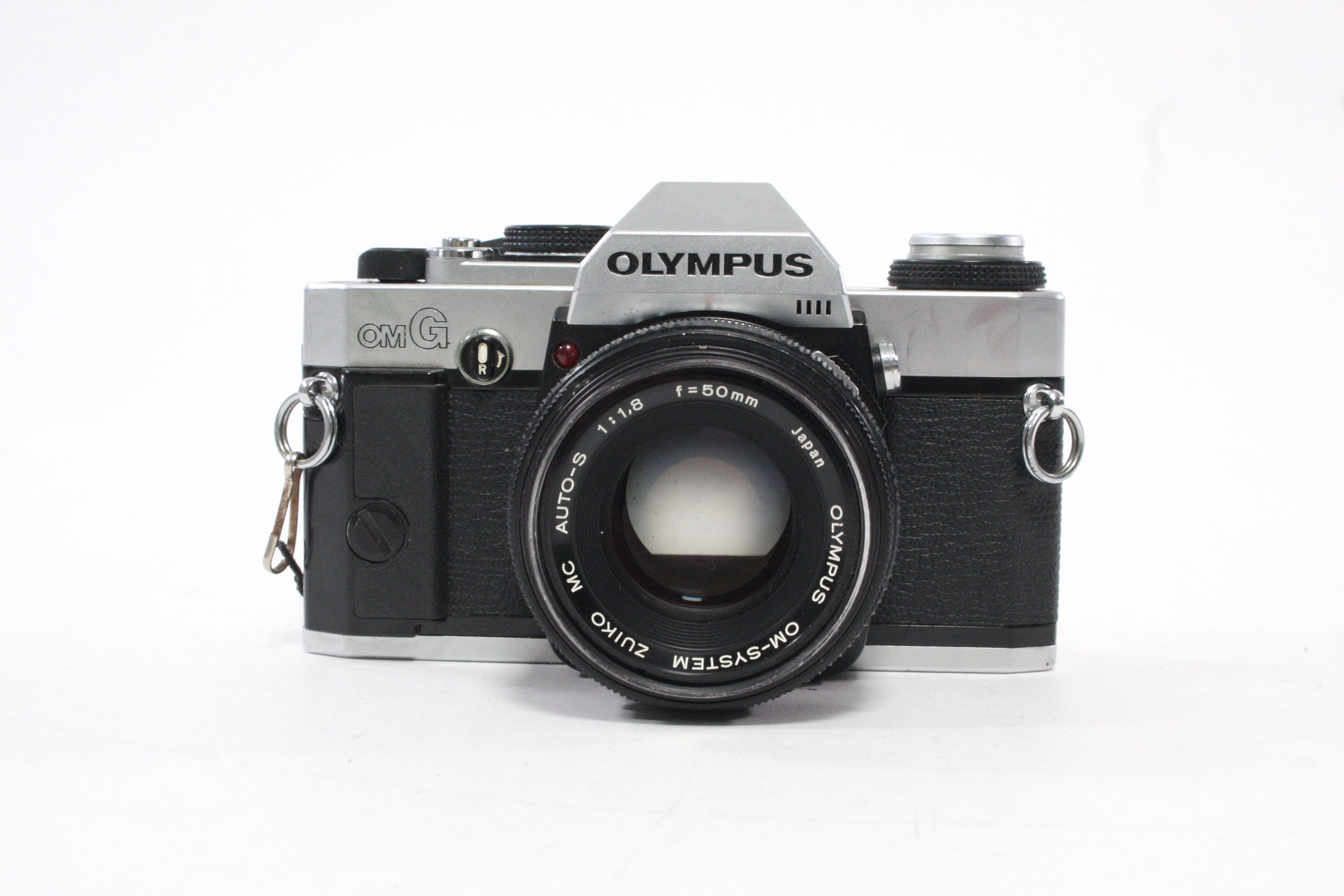 Olympus OMG 35mm SLR Camera with 50mm f/1.8 Lens