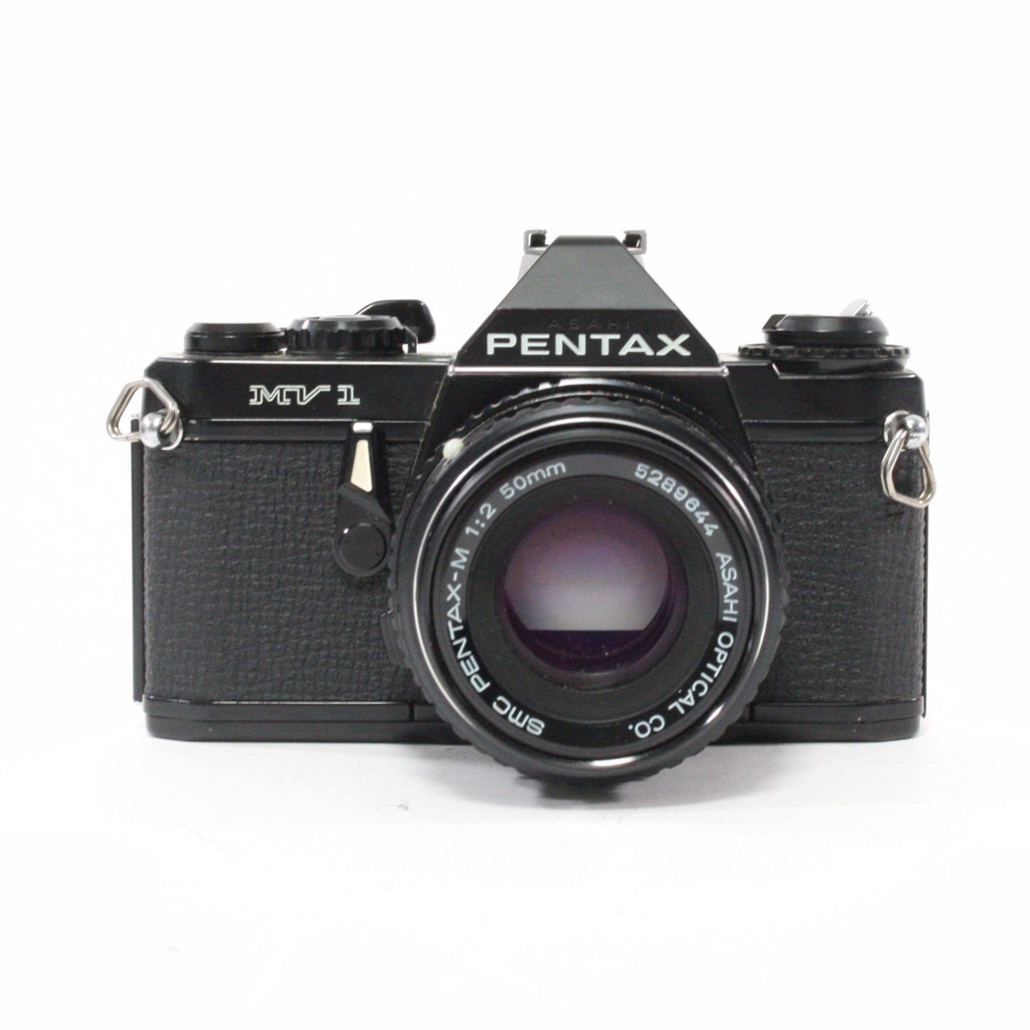 Pentax MV1 with a 50mm f/2 lens.