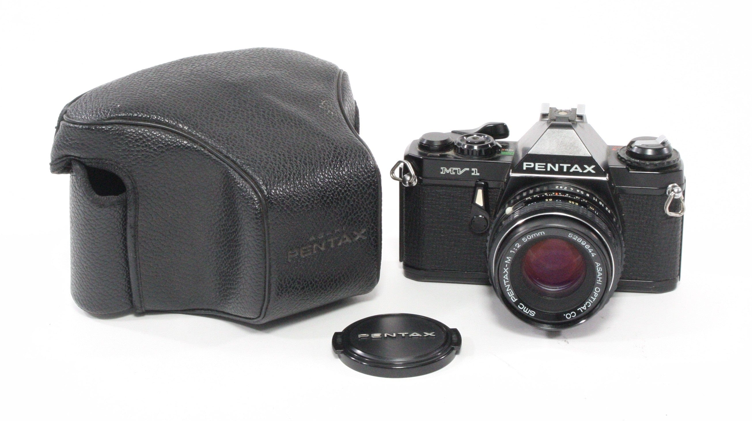 Pentax MV1 with a 50mm f/2 lens.