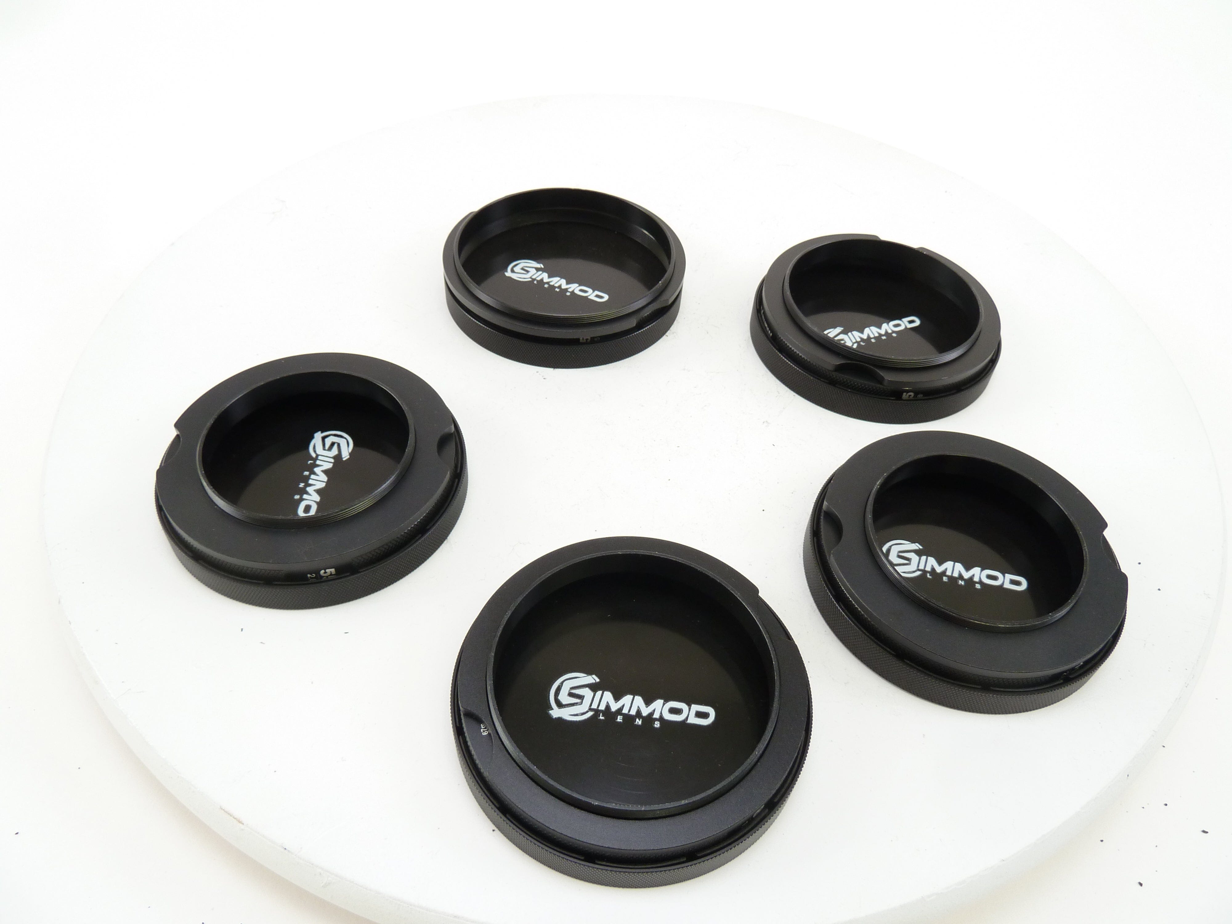Simmod hoods with caps for 5 Mamiya Lenses