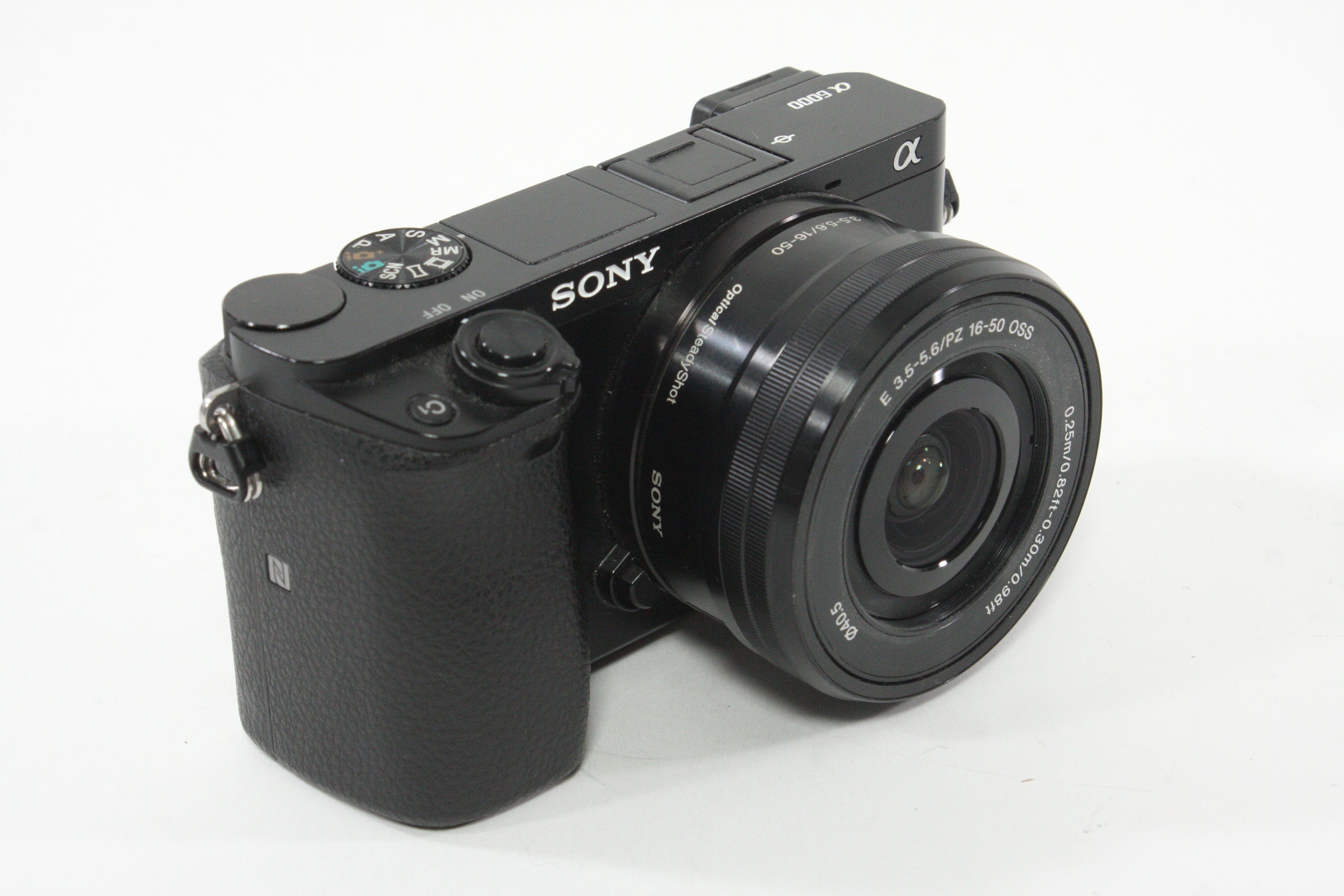 Sony a6000 w/16-60mm F3.5-5.6 Lens + SmallRig Cage and Battery Grip - Shutter Count 7307