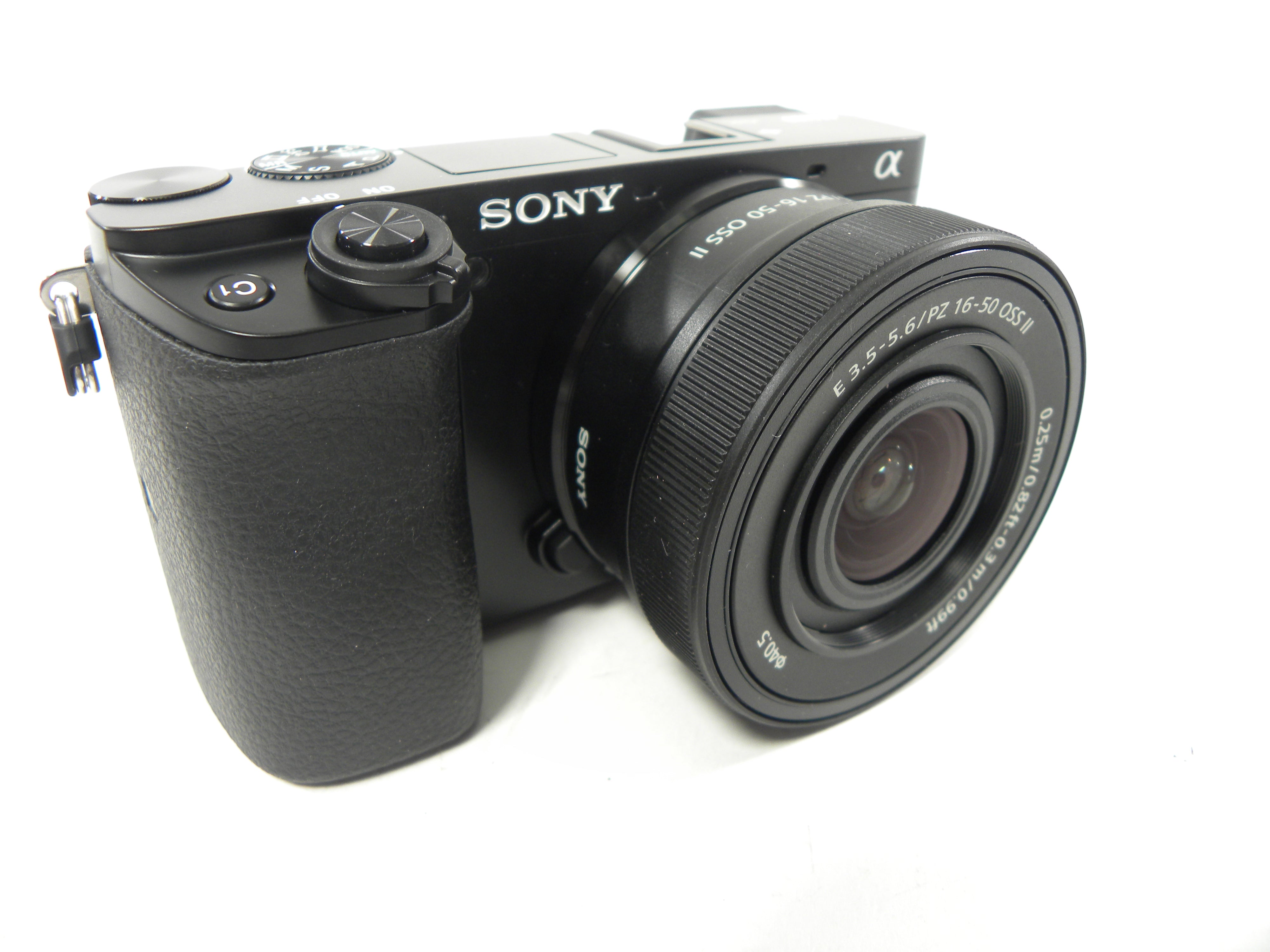 Sony a6100 24.2mp Digital Mirrorless w/PZ 16-50 f3.5-5.6 OSS II Shutter Ct. 2