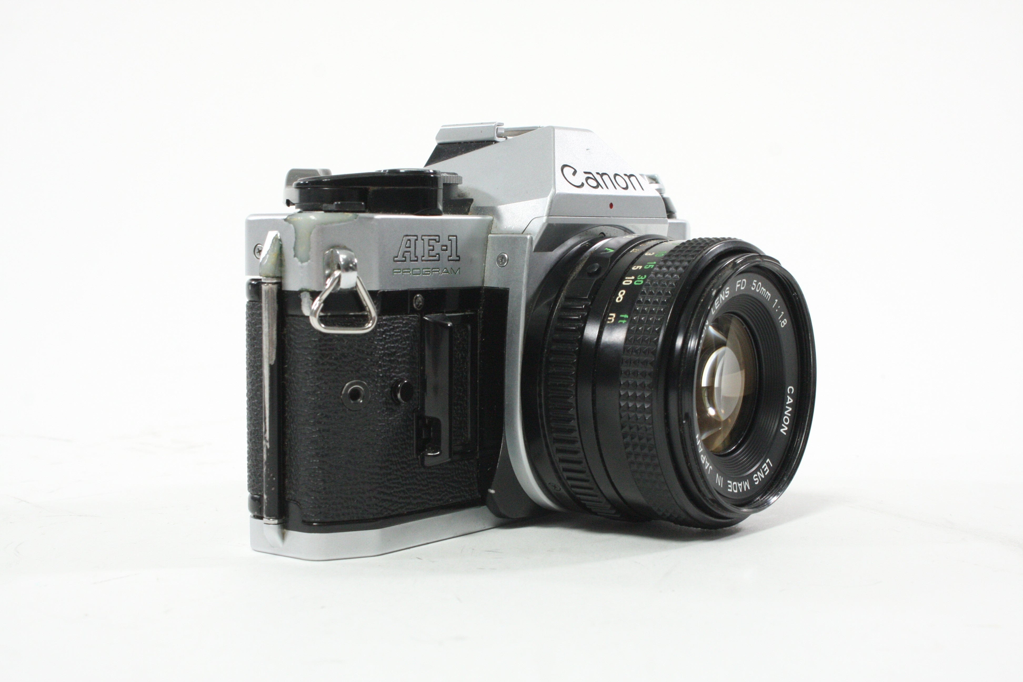 Canon AE-1 Program 35mm SLR Camera with 50mm f/1.8 FD Lens