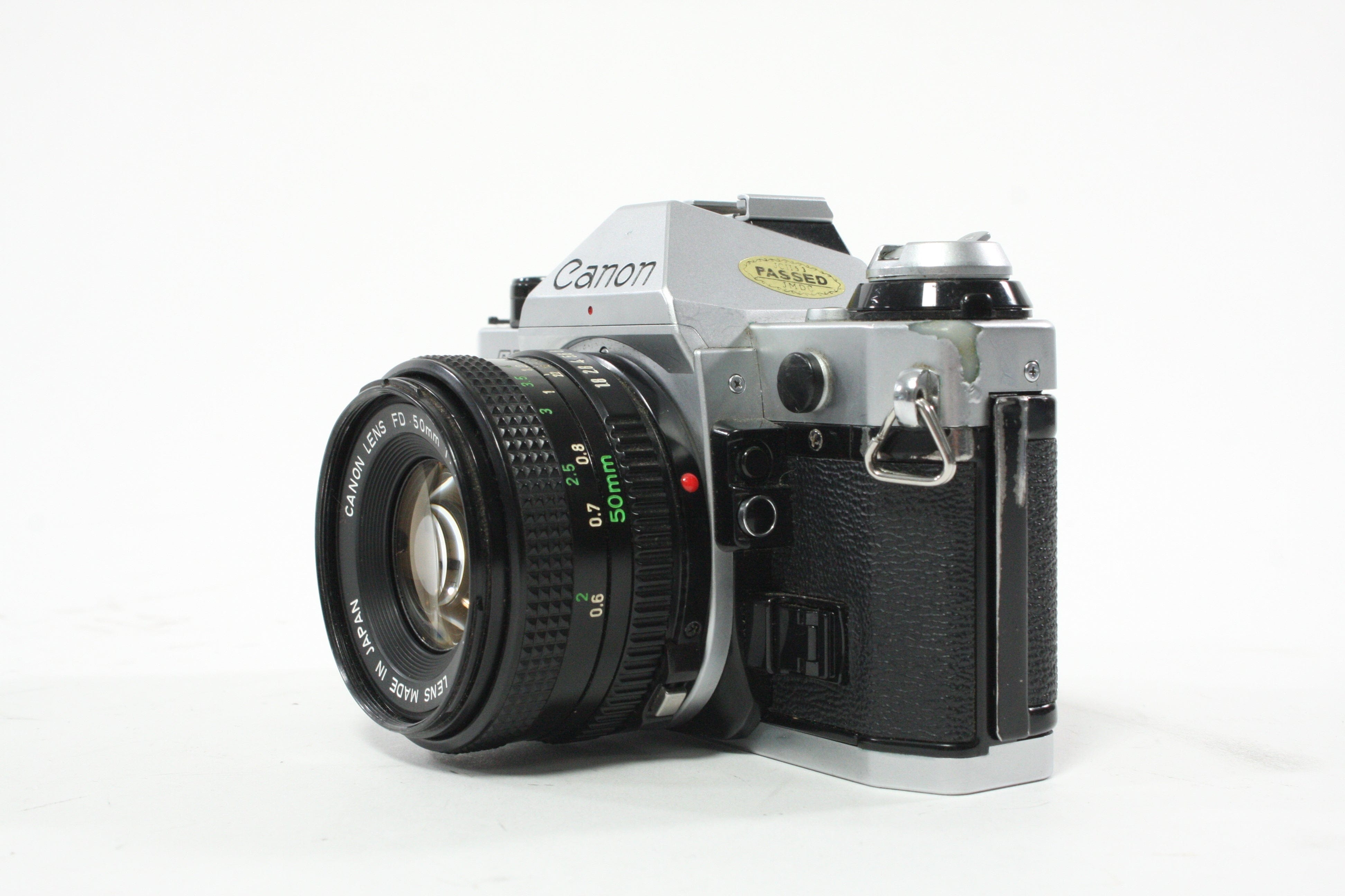 Canon AE-1 Program 35mm SLR Camera with 50mm f/1.8 FD Lens