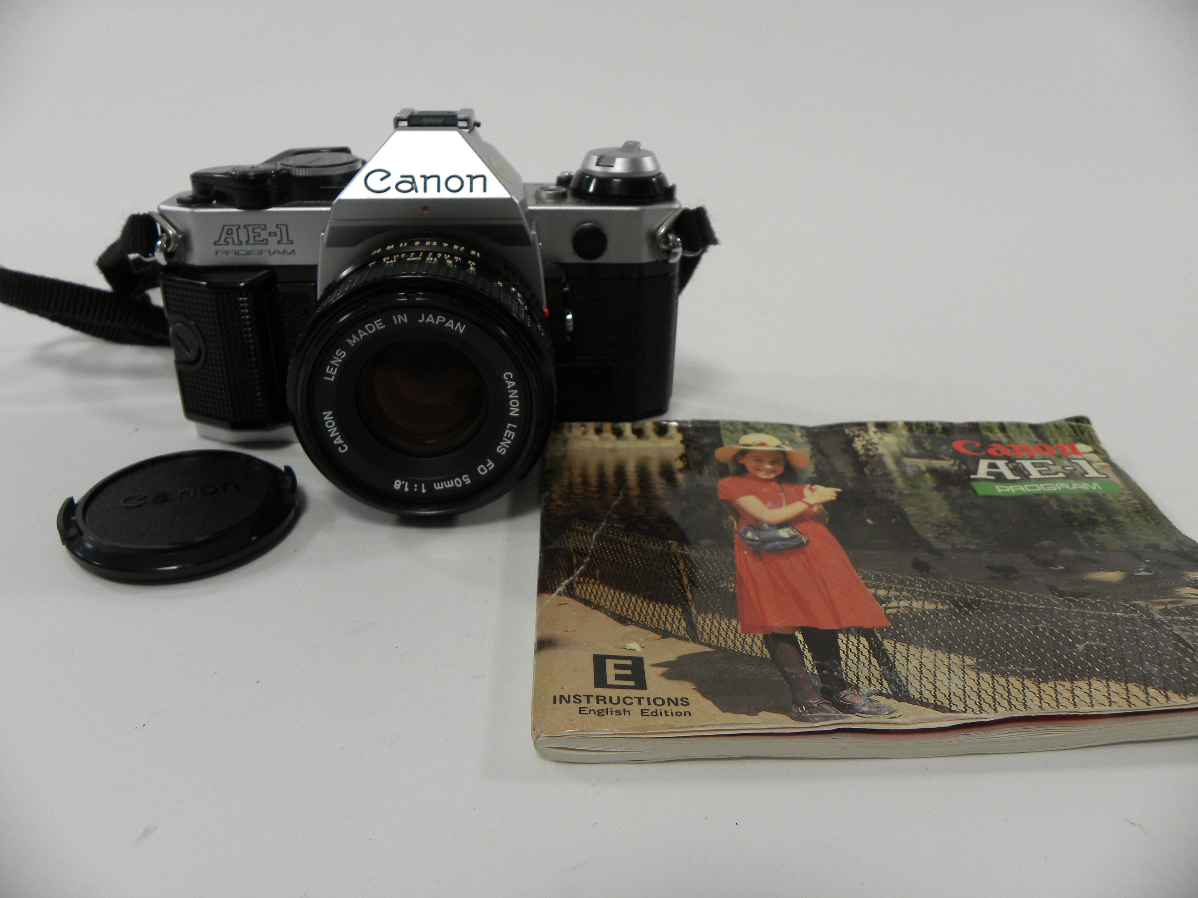 Canon AE-1 Program 35mm SLR Camera with a 50mm f/1.8 FD Lens