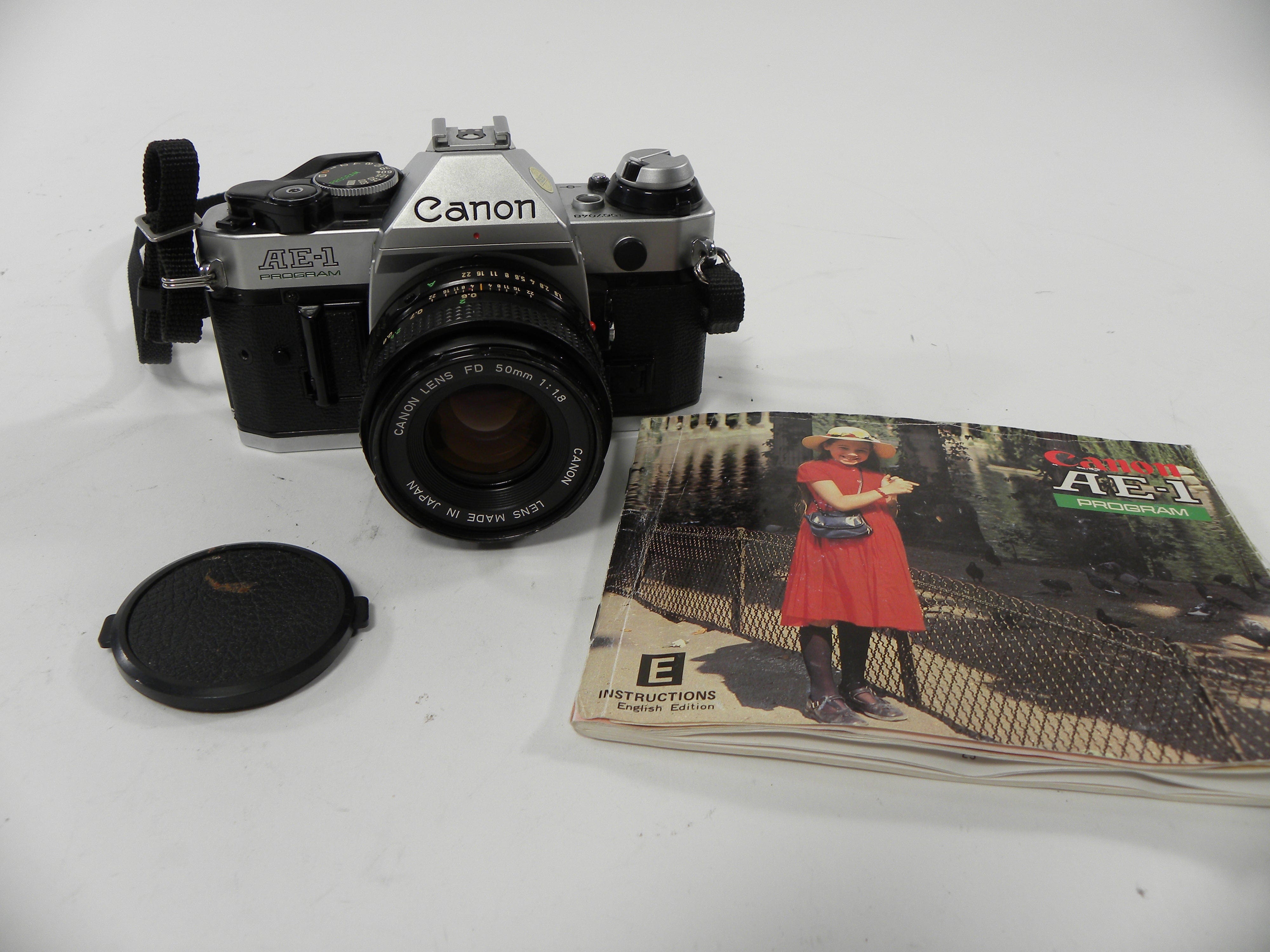 Canon AE-1 Program 35mm SLR Camera with a 50mm f/1.8 S.C. FD Lens