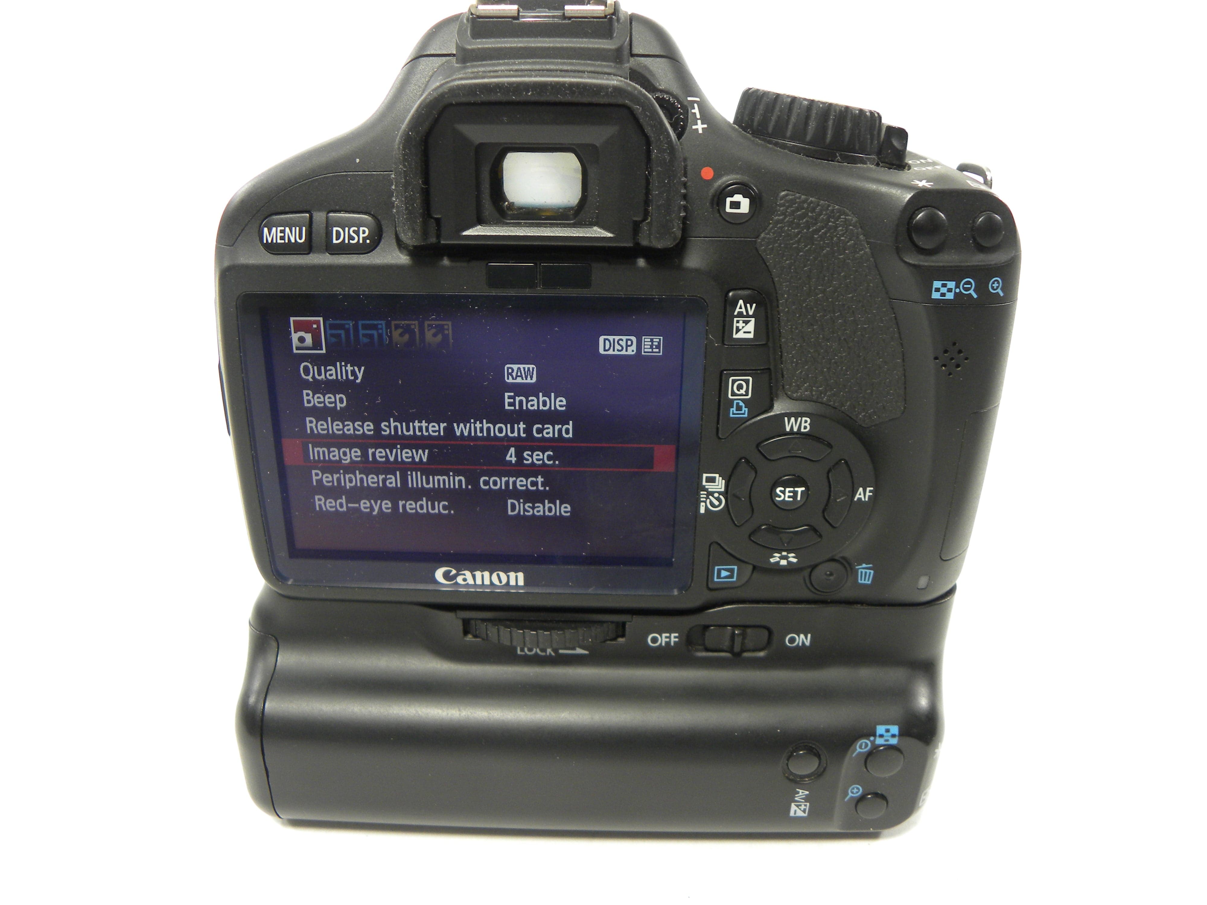 Canon EOS Rebel T2i 18mp Digital SLR w/EF-S 18-55 and grip S/C 2,489