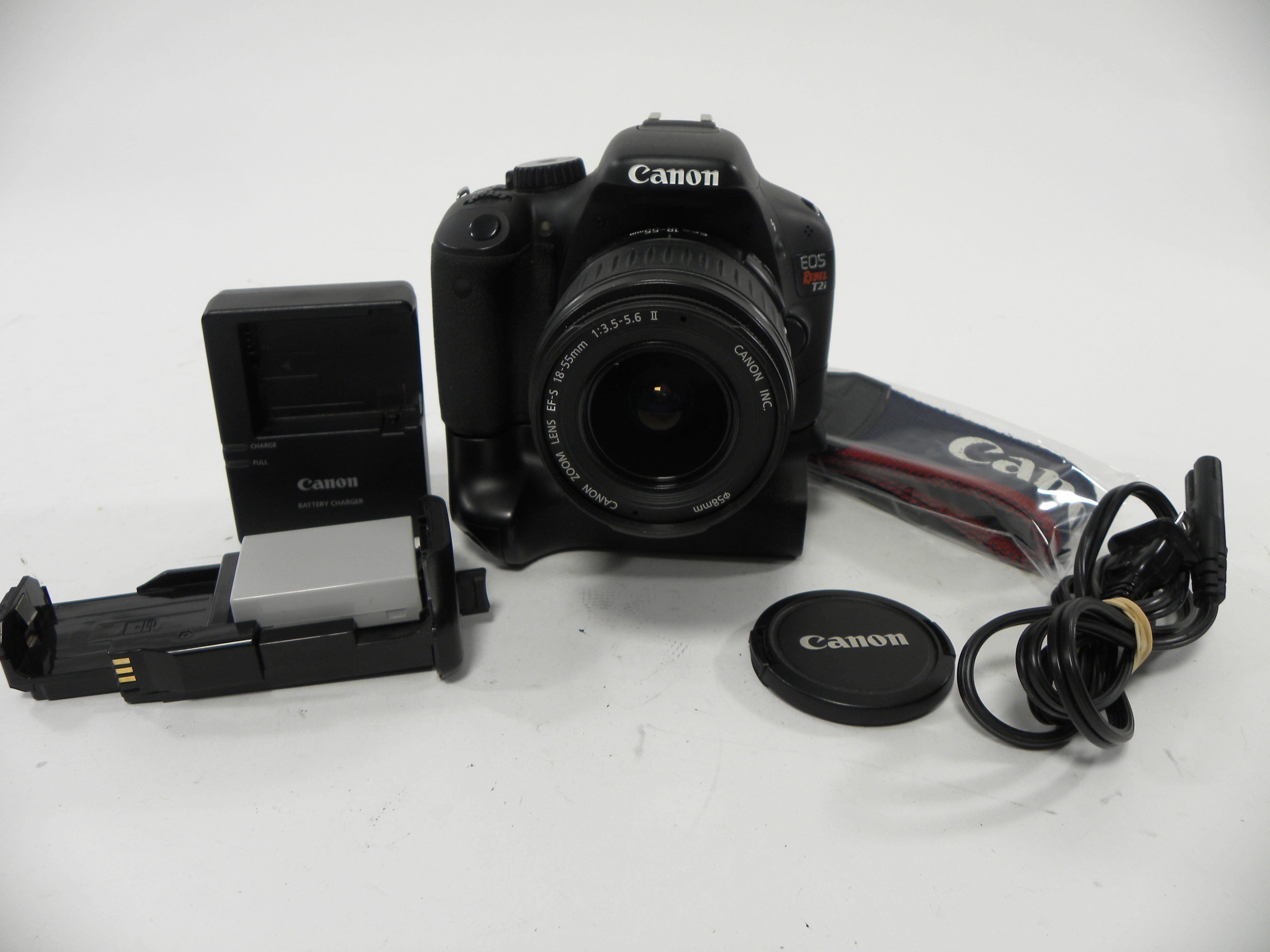 Canon EOS Rebel T2i 18mp Digital SLR w/EF-S 18-55 and grip S/C 2,489