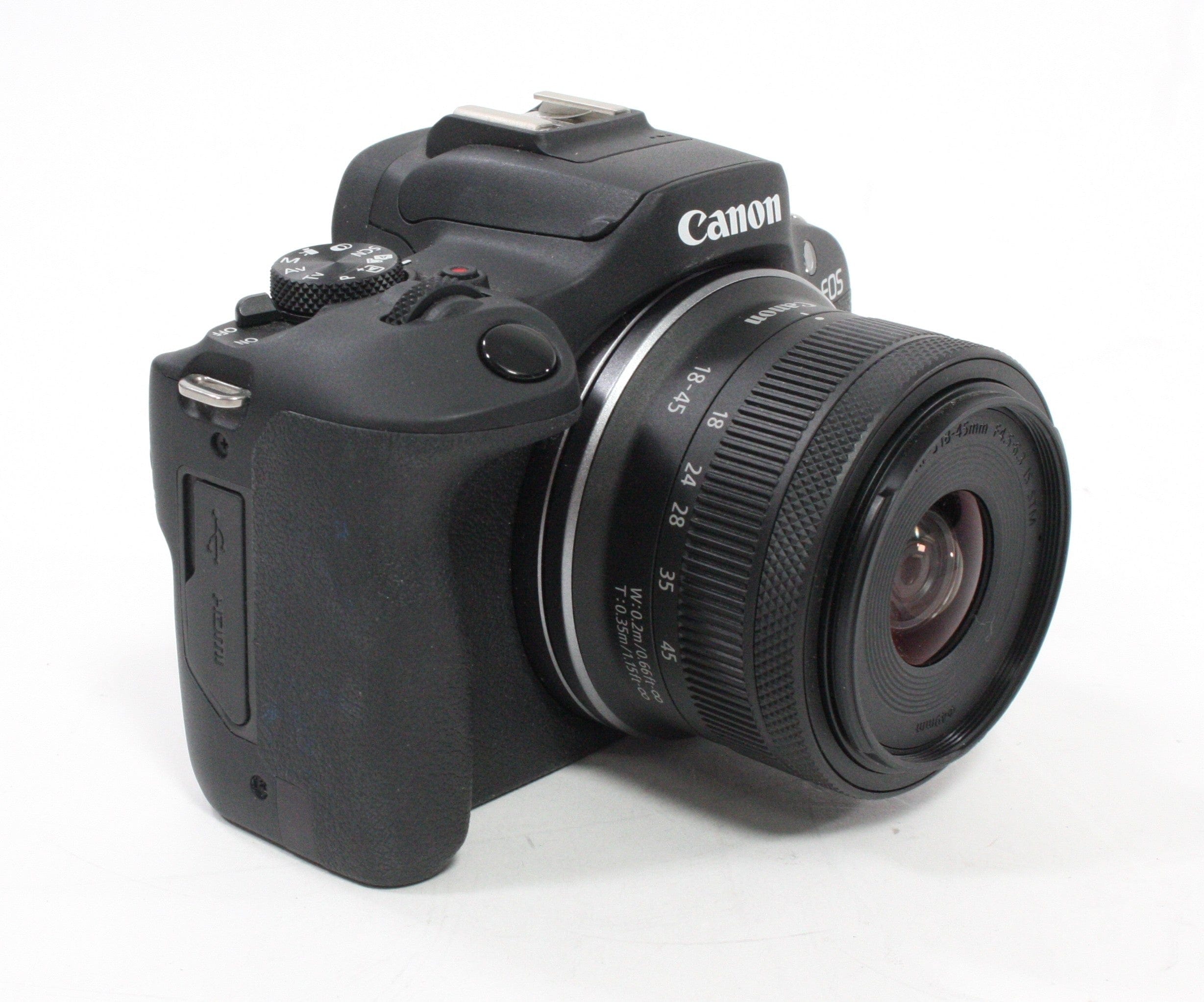 Canon R100 Mirrorless Digital Camera with 18-45mm f/4.5-5.6 IS STM Lens with Shutter Count (less than) 1,000