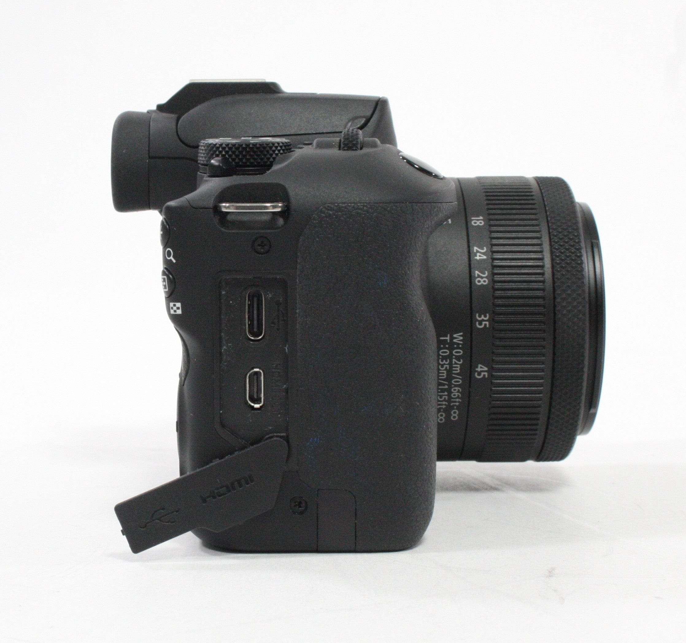 Canon R100 Mirrorless Digital Camera with 18-45mm f/4.5-5.6 IS STM Lens with Shutter Count (less than) 1,000