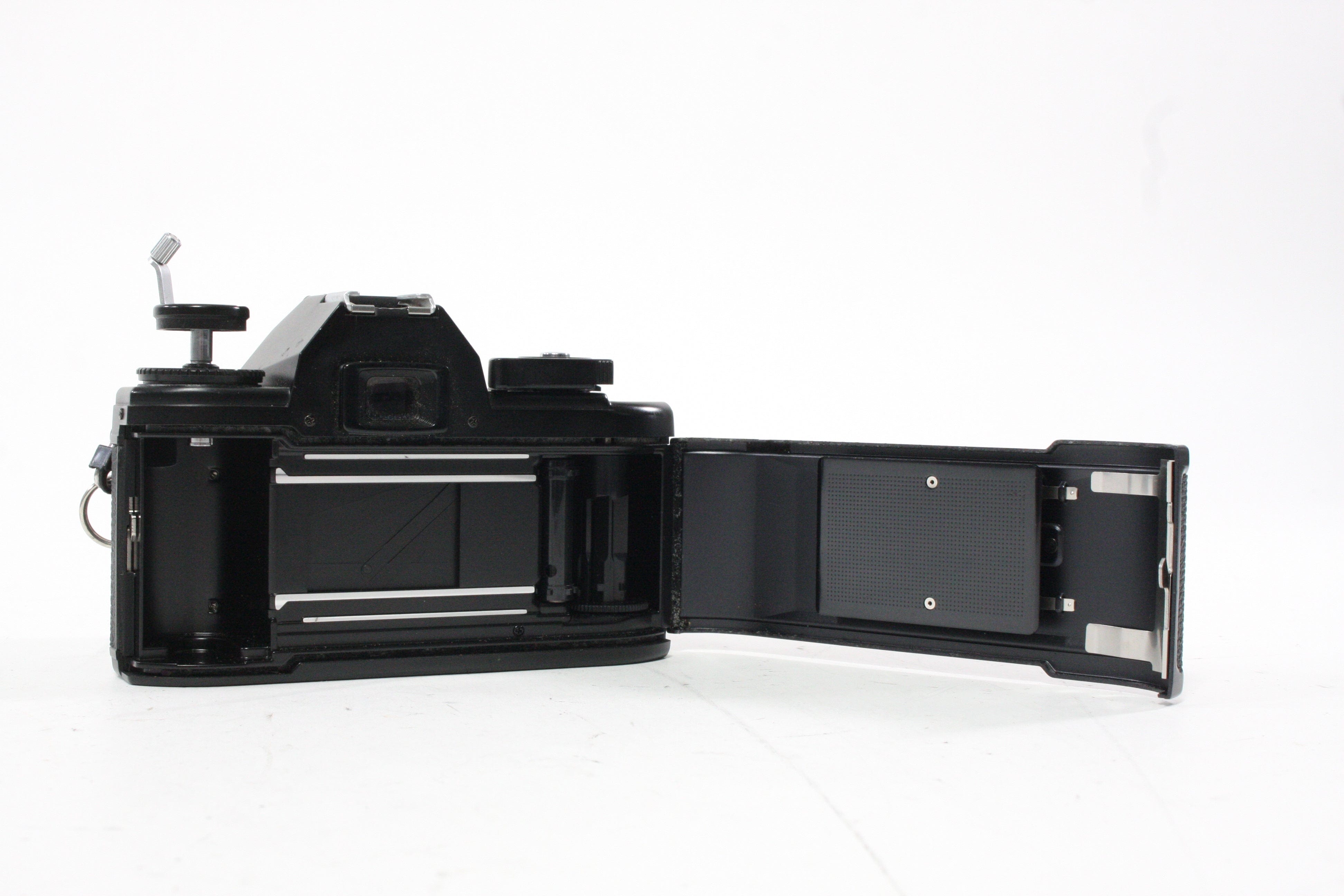 Nikon EM 35mm Camera with 50mm f/1.8 E Series Lens