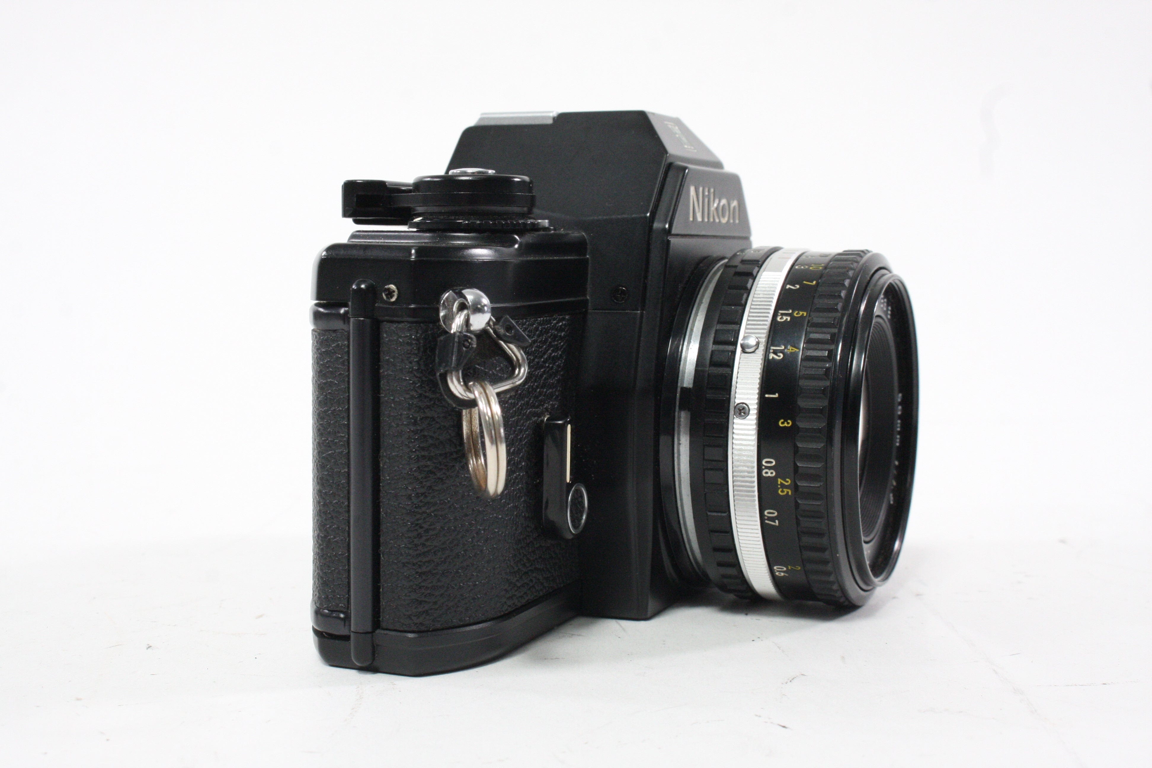 Nikon EM 35mm Camera with 50mm f/1.8 E Series Lens