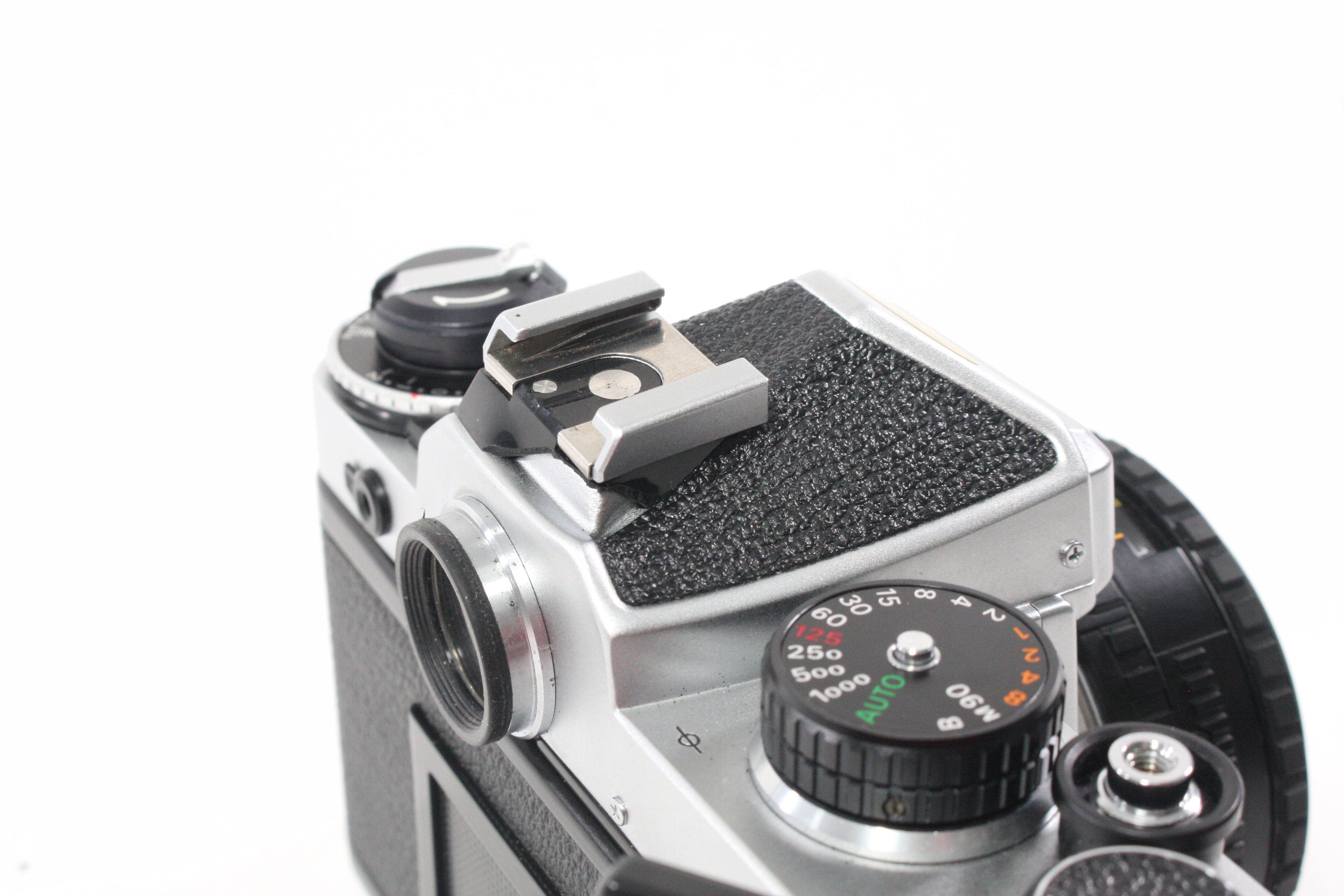 Nikon FE Chrome 35mm SLR Camera with 50mm f/1.8 Lens