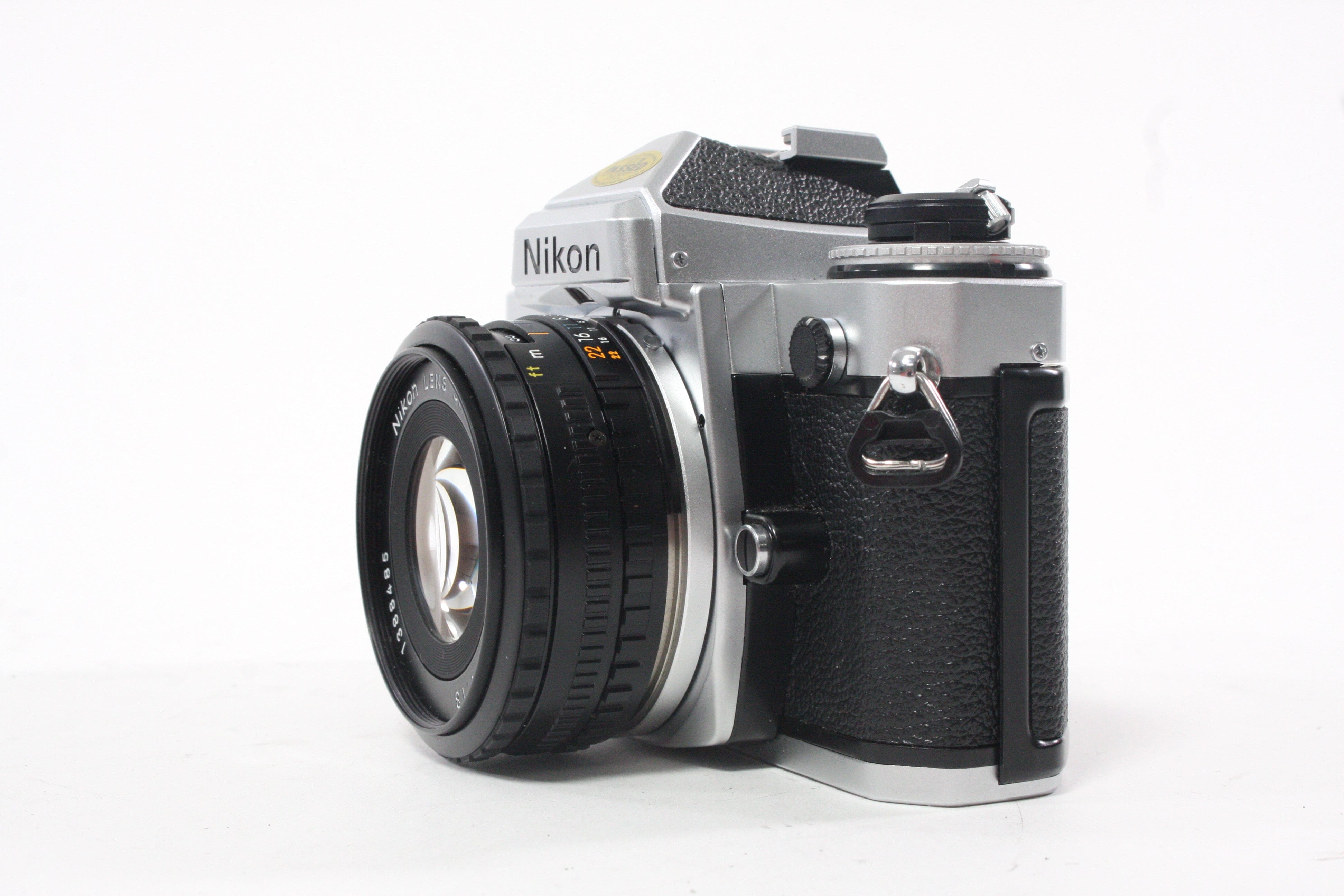 Nikon FE Chrome 35mm SLR Camera with 50mm f/1.8 Lens