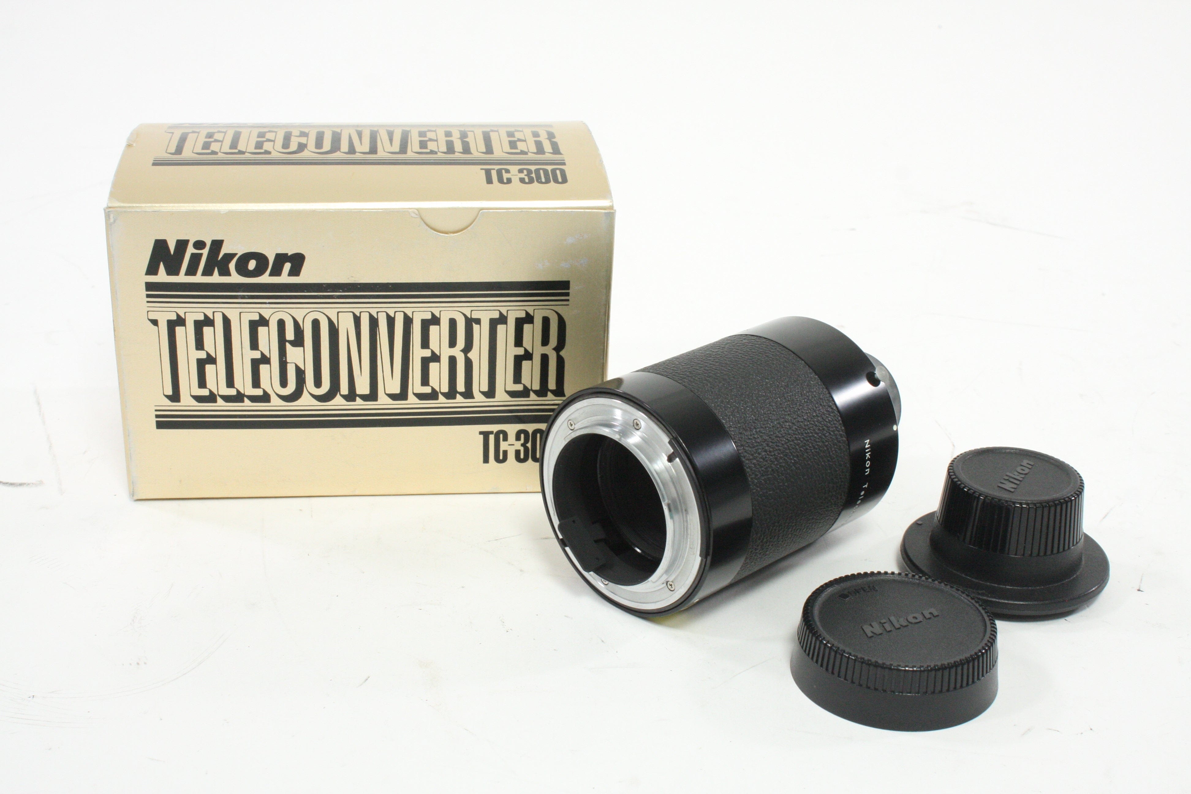 Nikon Teleconverter TC-300 2X for Nikon AI Lenses with a Focal Length of over 300mm.