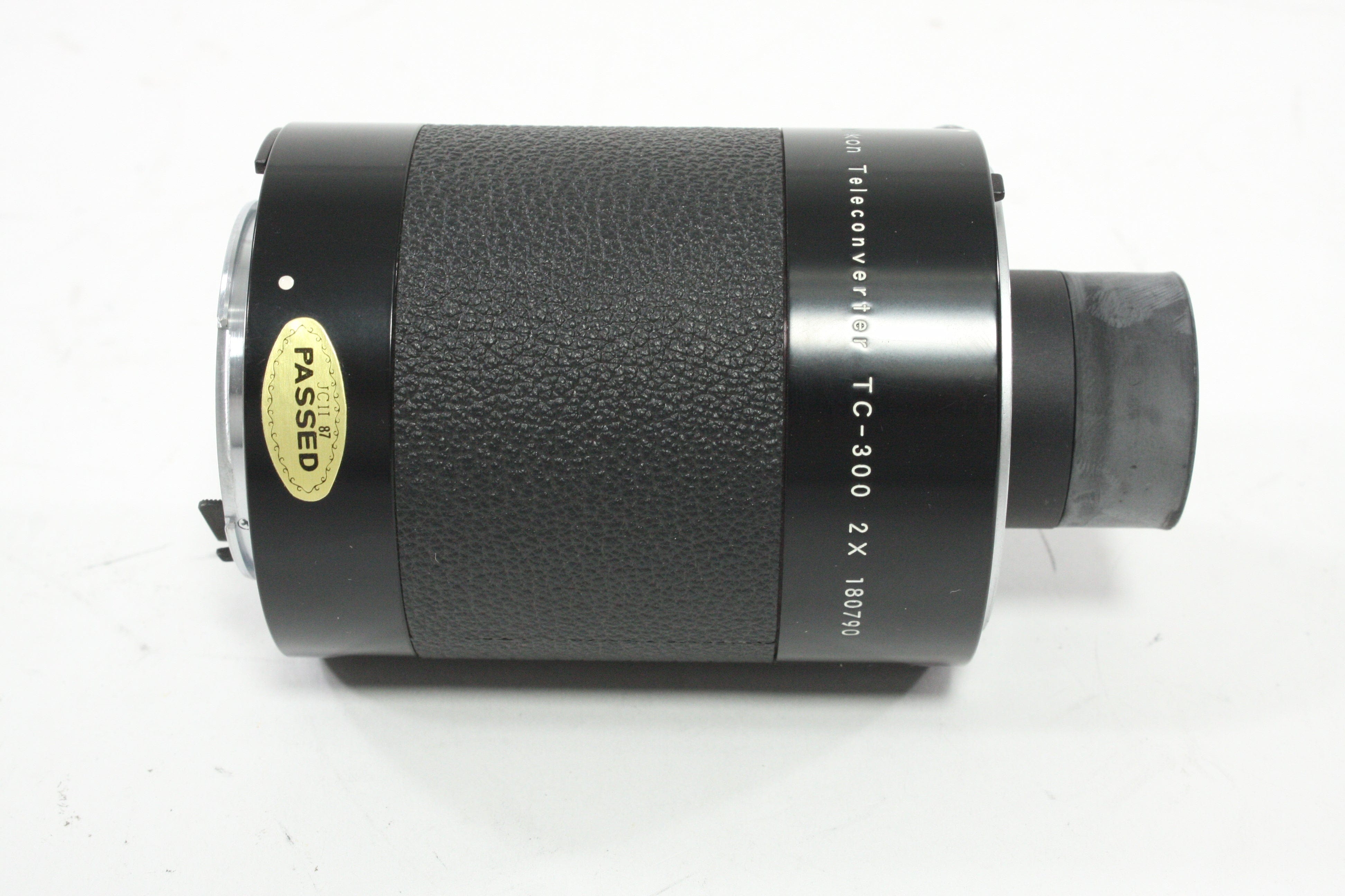 Nikon Teleconverter TC-300 2X for Nikon AI Lenses with a Focal Length of over 300mm.