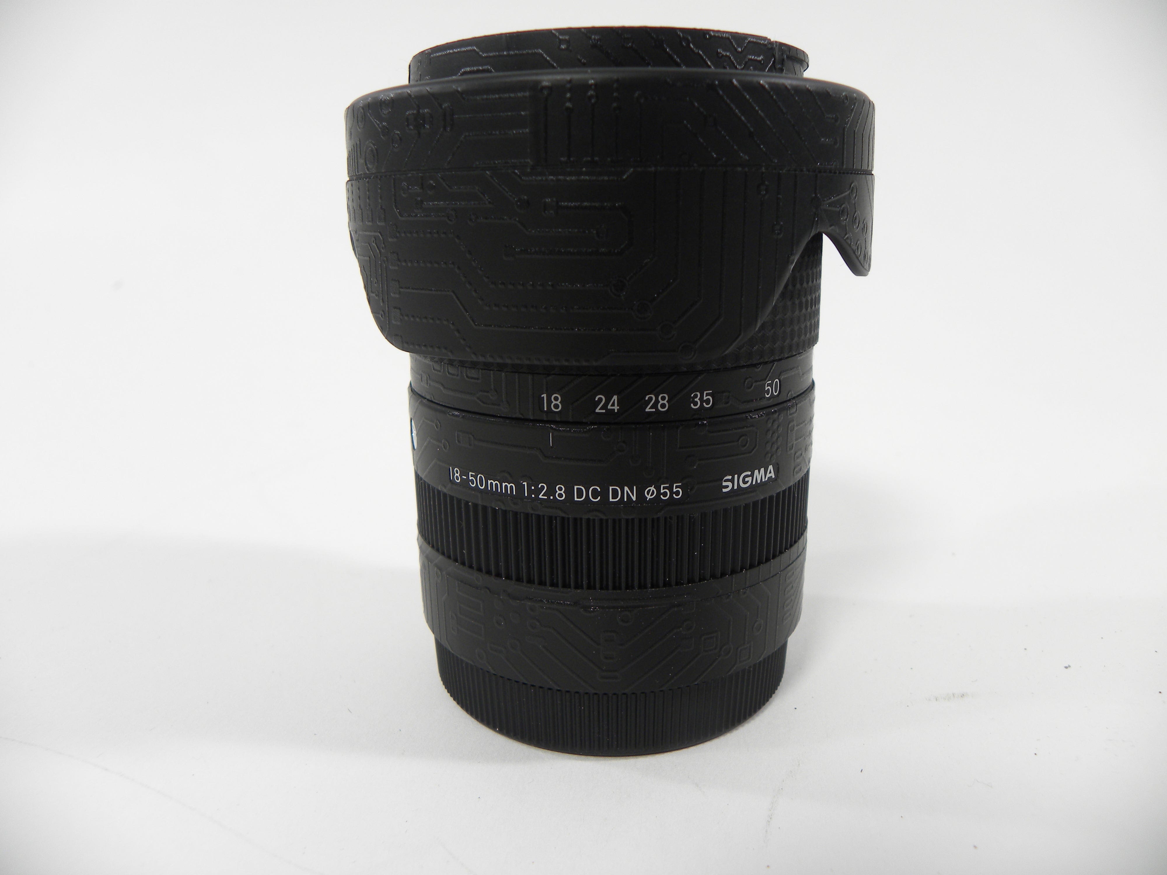 Sigma DC DN 18-50mm f2.8 Sony E Mount w/Skin