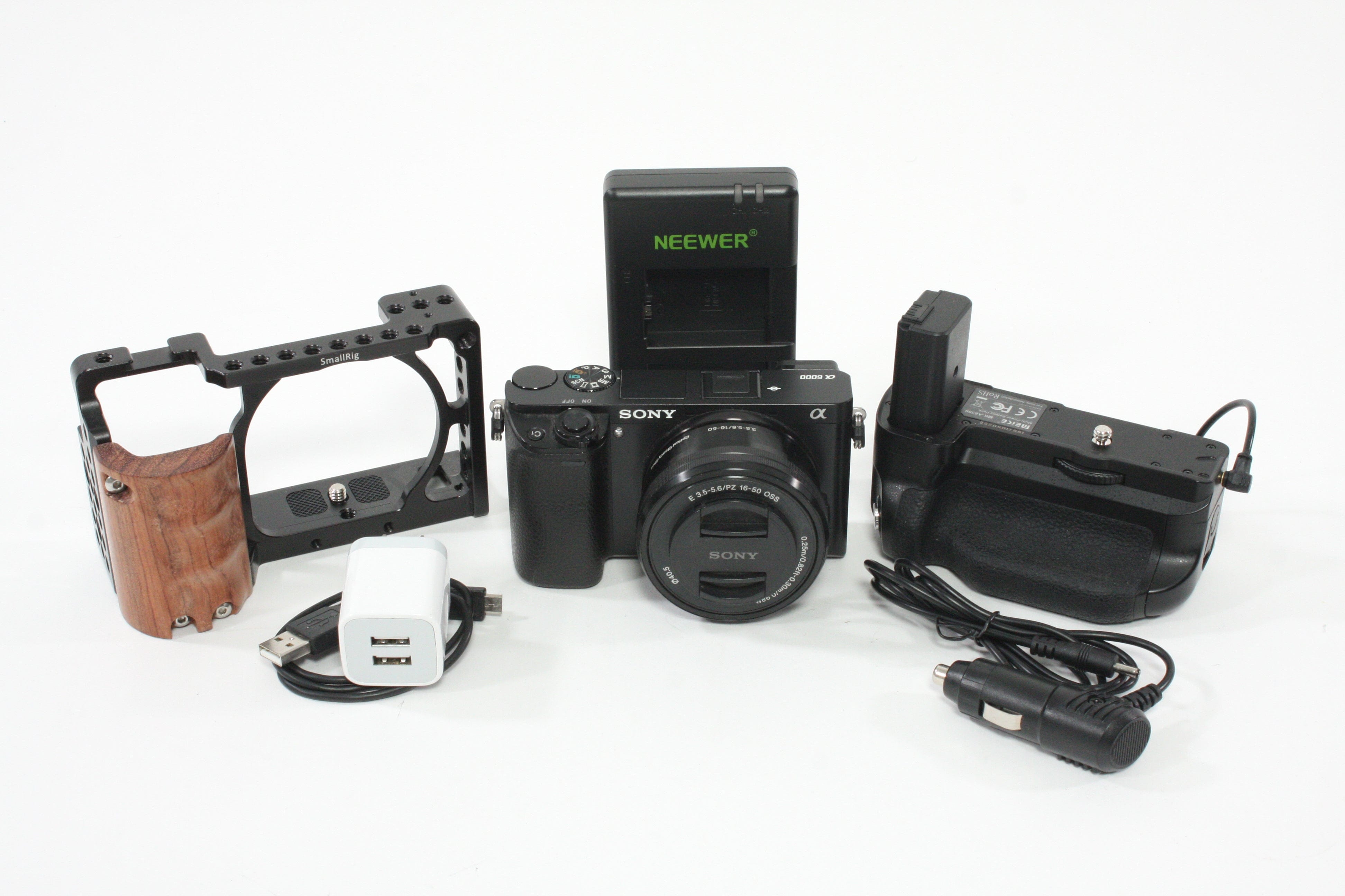 Sony a6000 w/16-60mm F3.5-5.6 Lens + SmallRig Cage and Battery Grip - Shutter Count 7307