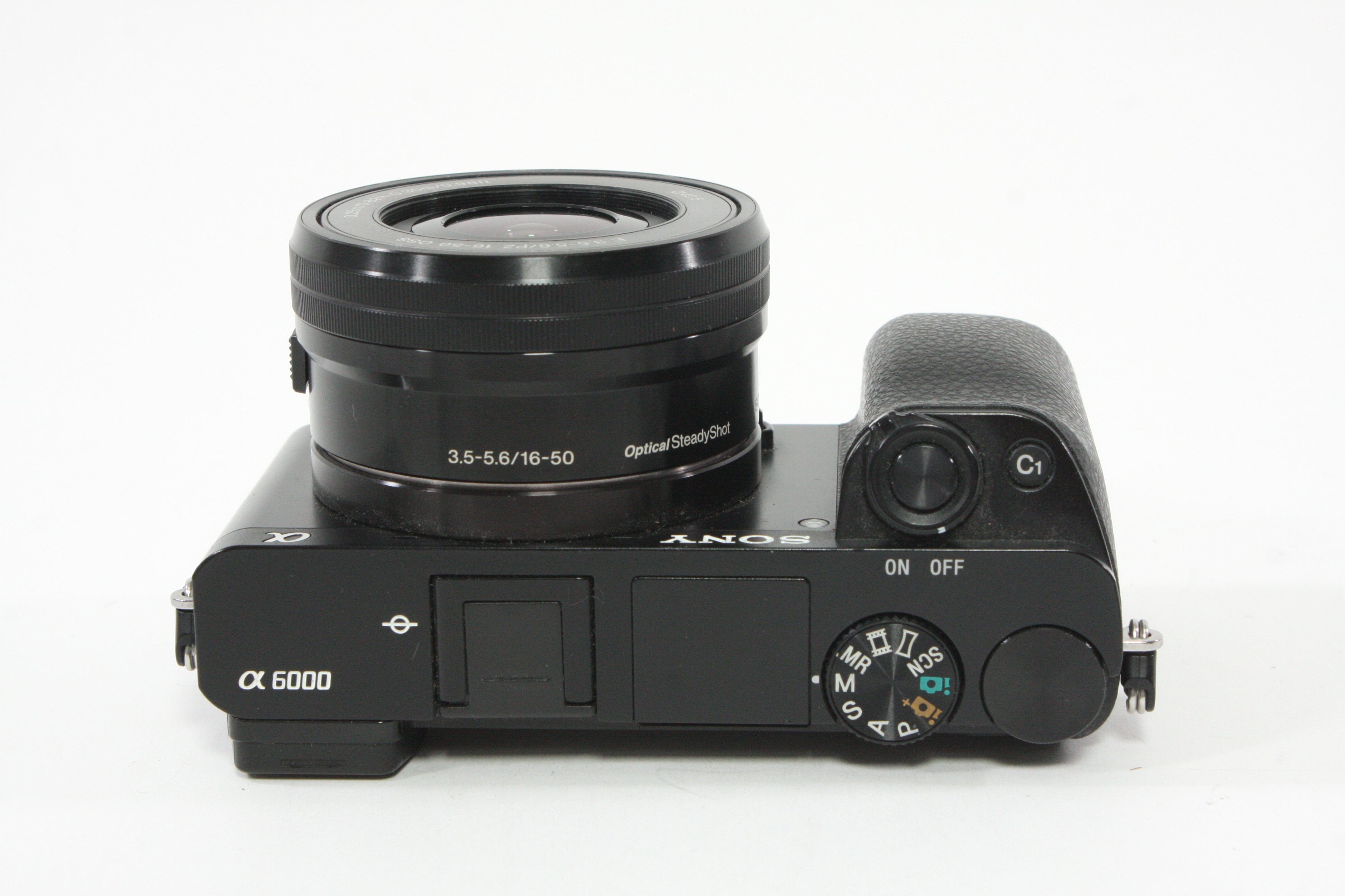 Sony a6000 w/16-60mm F3.5-5.6 Lens + SmallRig Cage and Battery Grip - Shutter Count 7307