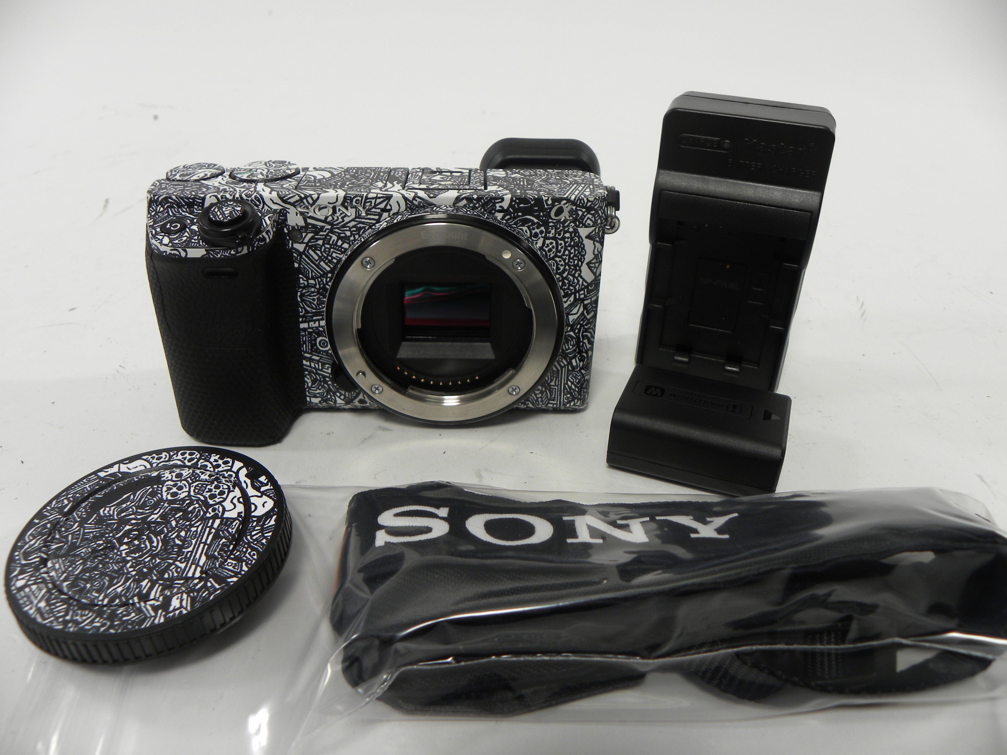 Sony a6400 24.2mp Mirrorless Digital camera Body Only  w/Skin Shutter Ct. 5,061